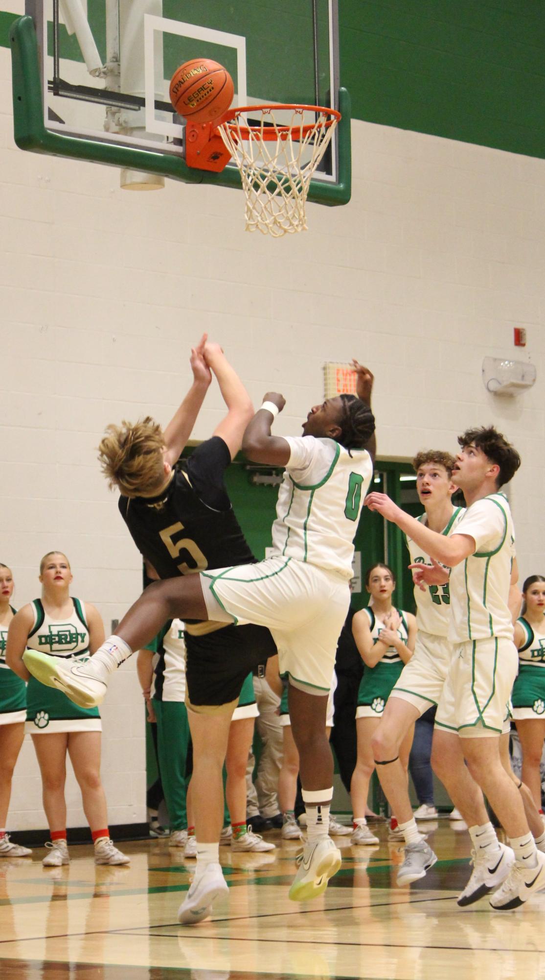 Boys varsity basketball vs. Maize south (Photos by Persephone Ivy)