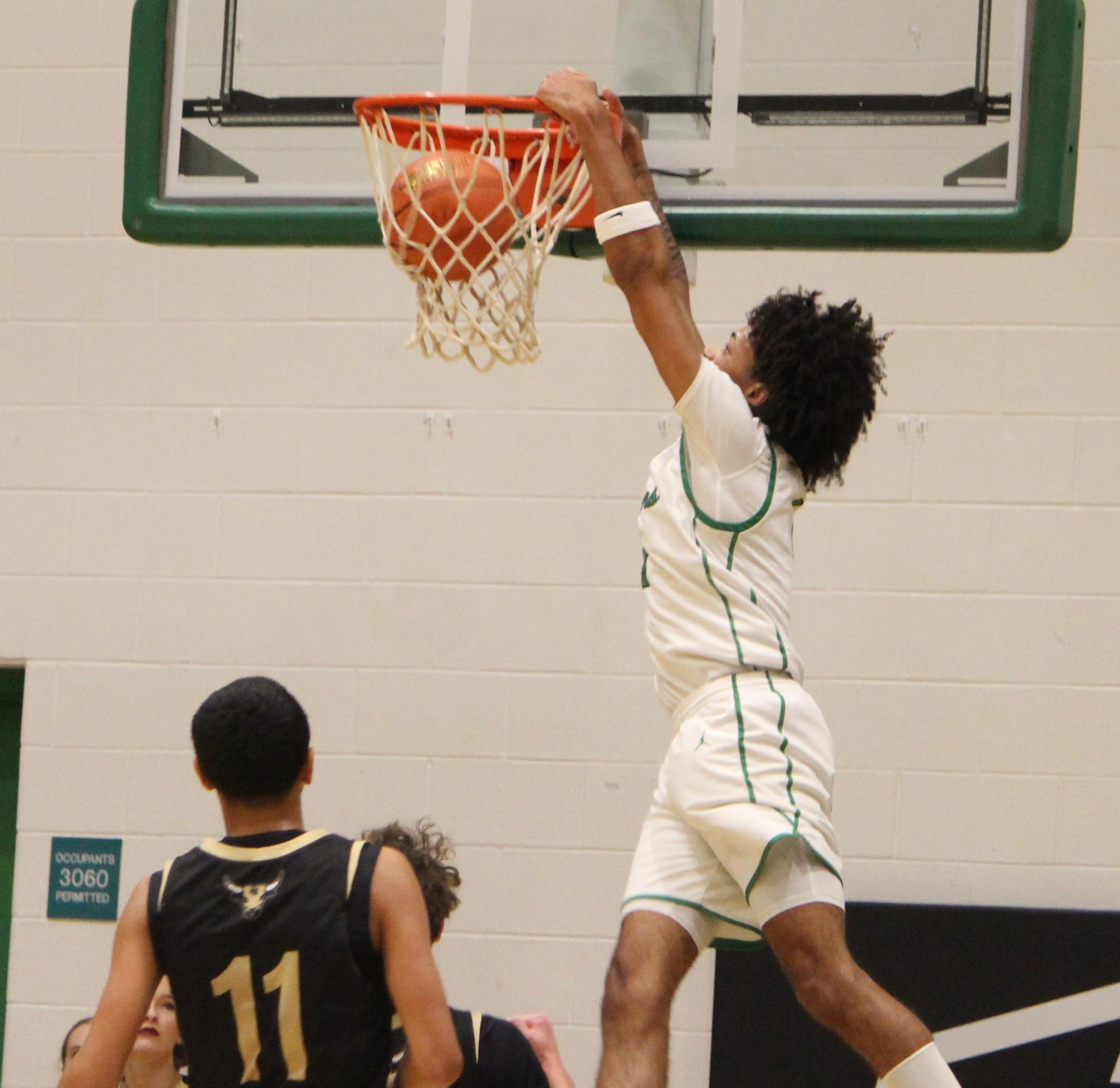 Boys varsity basketball vs. Maize south (Photos by Persephone Ivy)