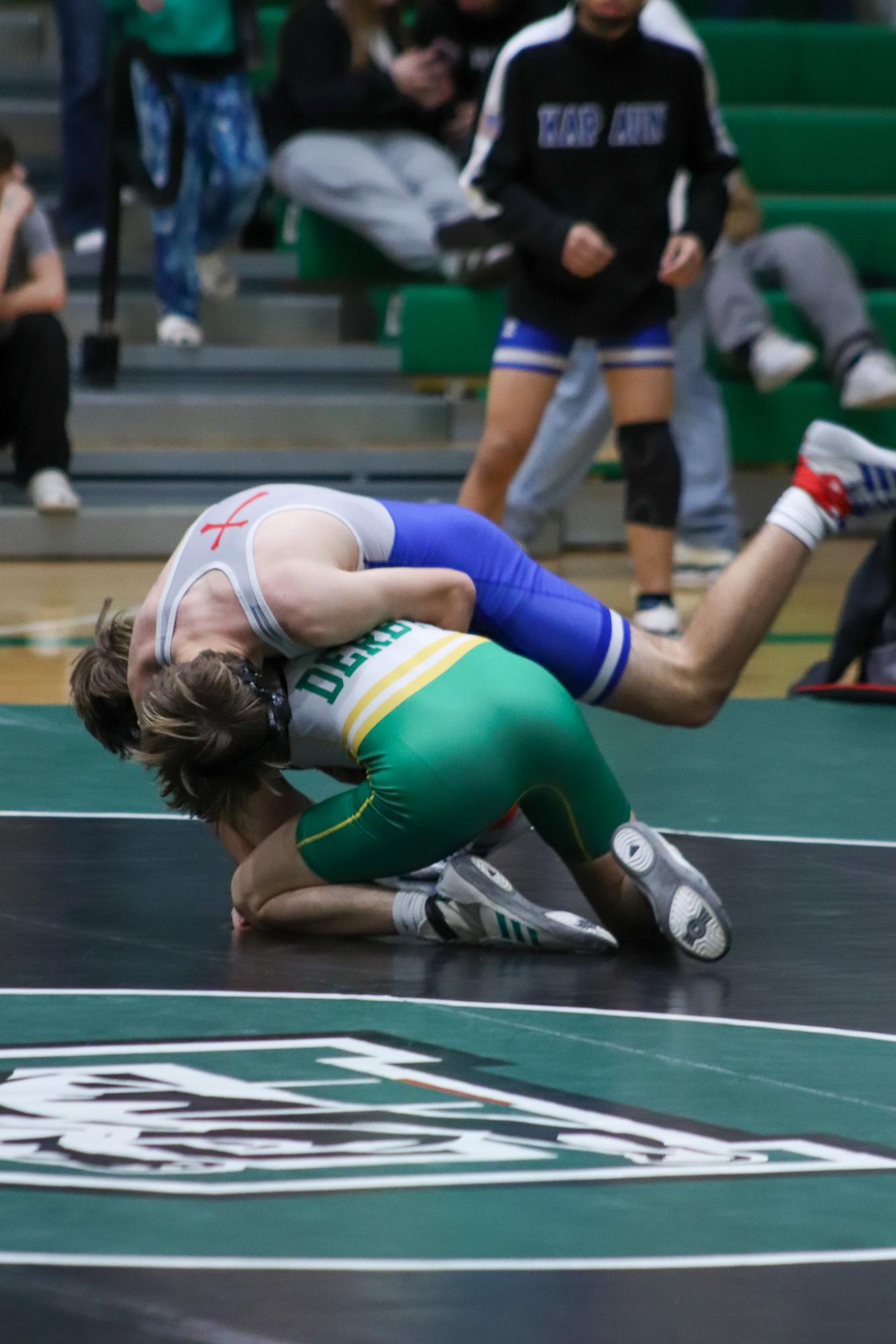 Girls and boys varsity wrestling vs. girls and boys Kapaun (Photos Delainey Stephenson)