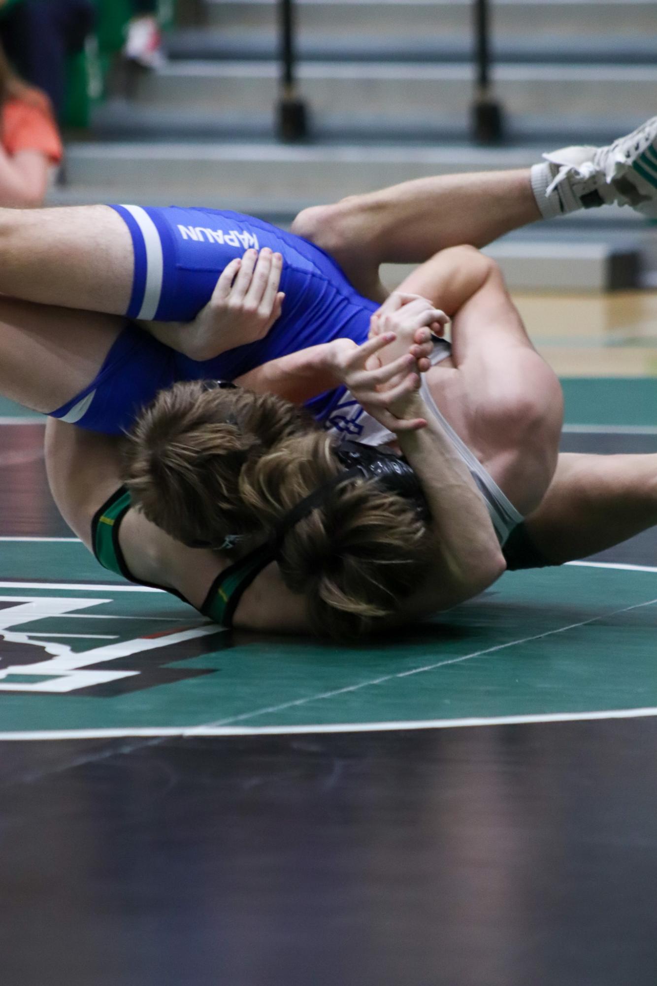 Girls and boys varsity wrestling vs. girls and boys Kapaun (Photos Delainey Stephenson)