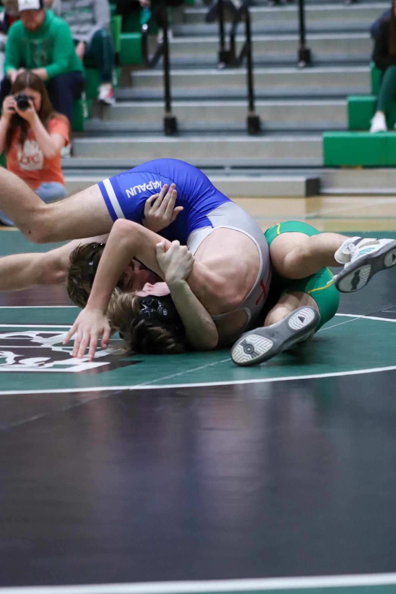 Girls and boys varsity wrestling vs. girls and boys Kapaun (Photos Delainey Stephenson)