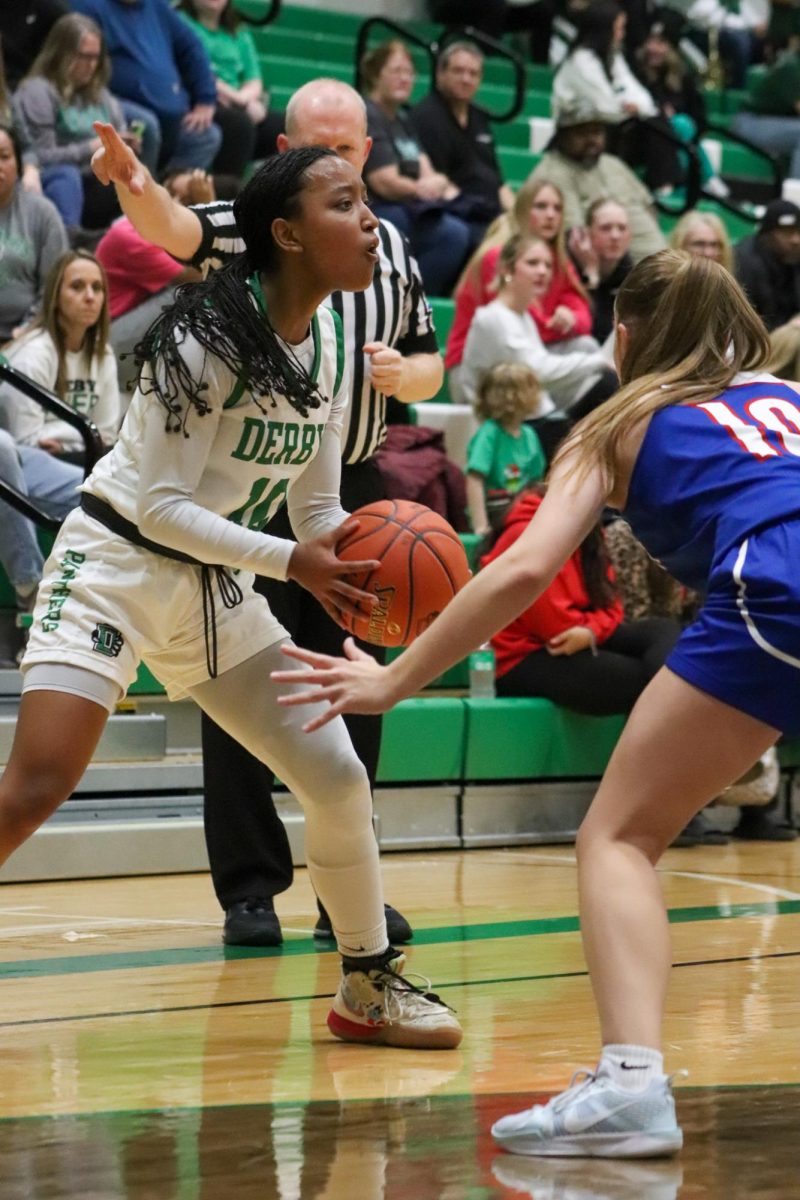 Player tries to keep possession of the ball. 