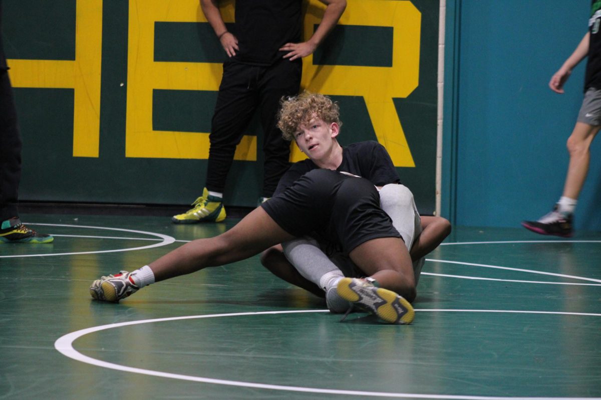 Wrestler gets taken down in a challenge match.