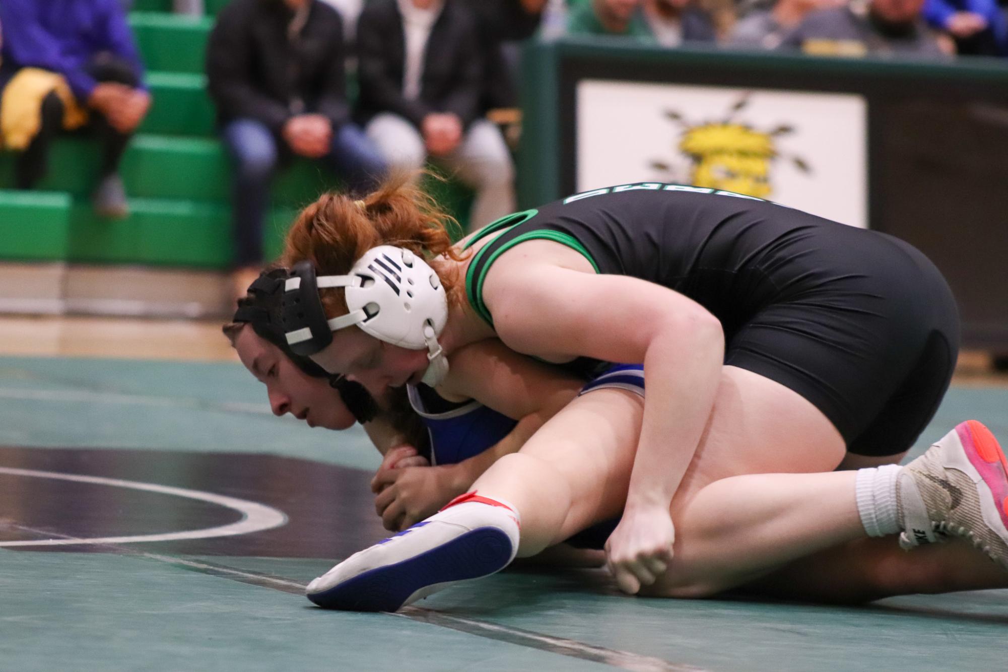 Girls and boys varsity wrestling vs. girls and boys Kapaun (Photos Delainey Stephenson)