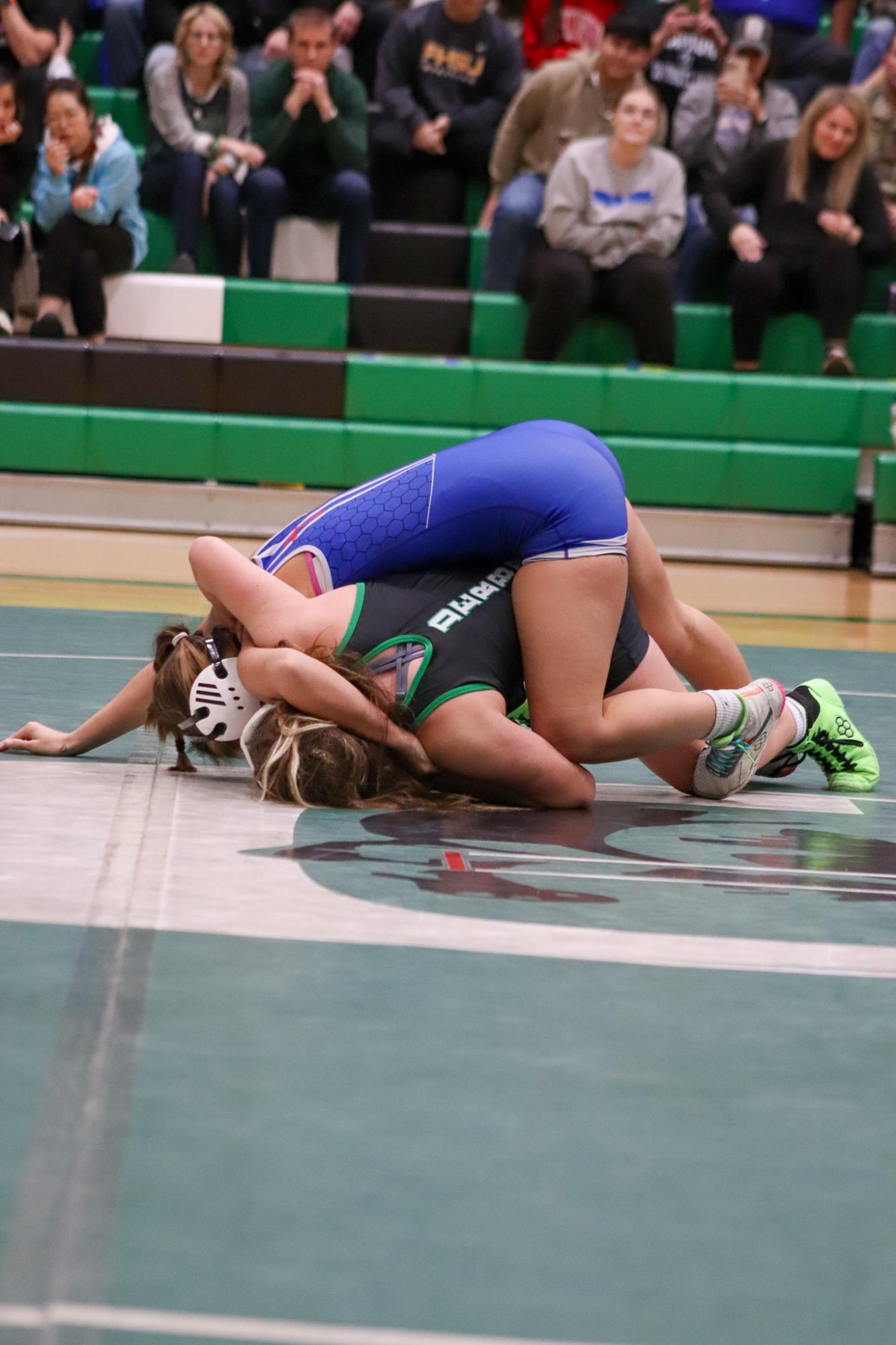 Girls and boys varsity wrestling vs. girls and boys Kapaun (Photos Delainey Stephenson)