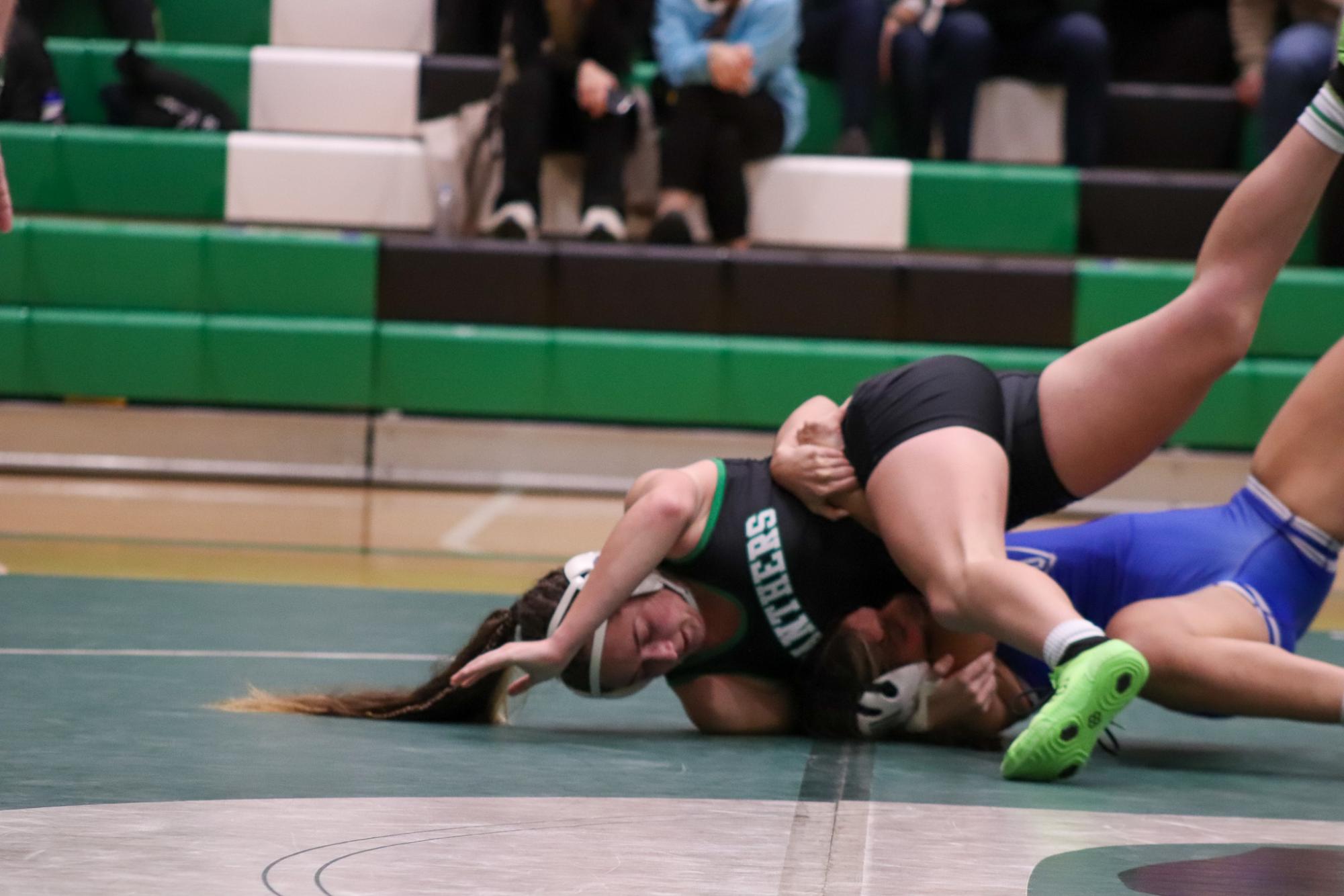 Girls and boys varsity wrestling vs. girls and boys Kapaun (Photos Delainey Stephenson)