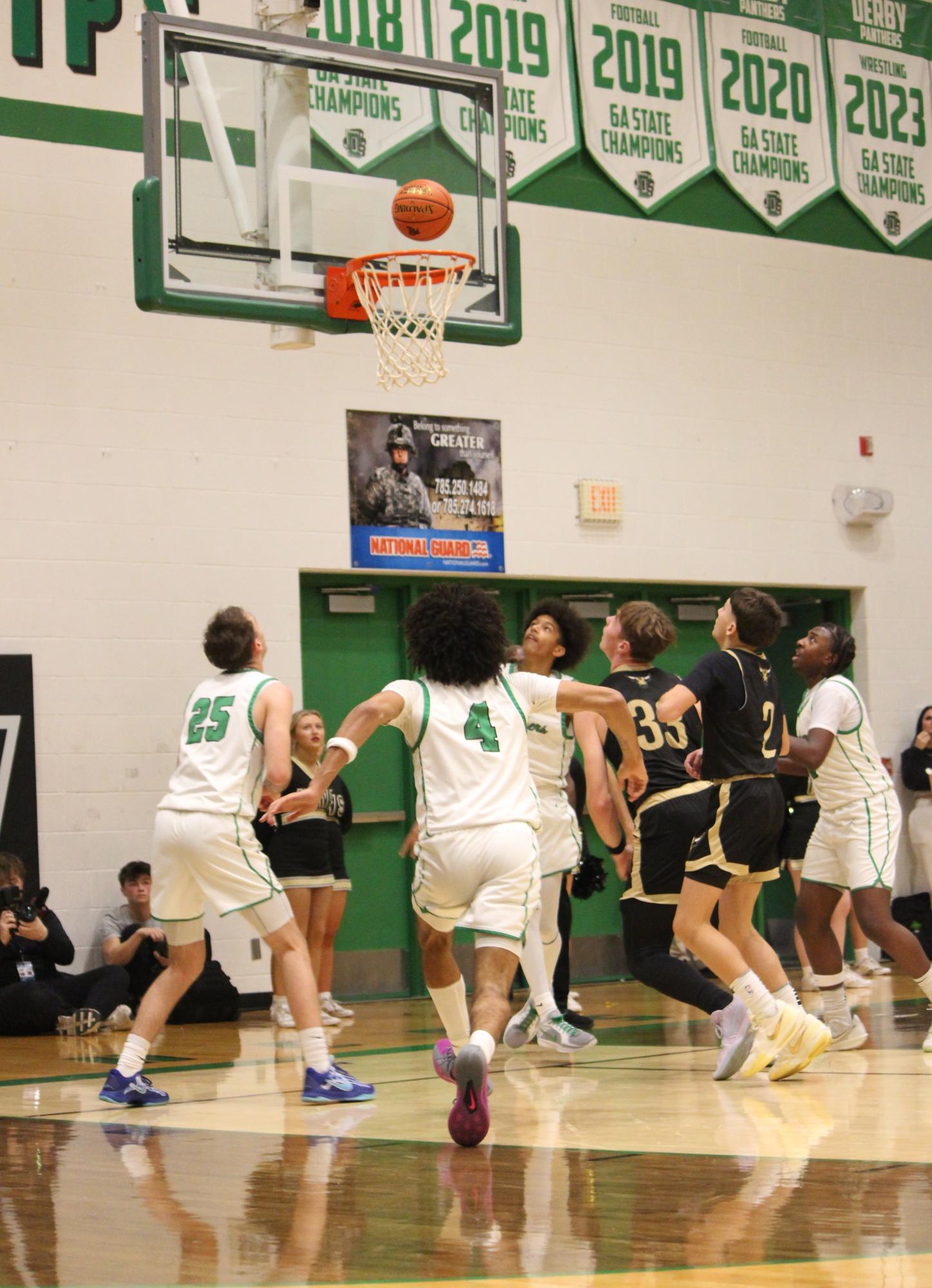 Boys varsity basketball vs. Maize south (Photos by Persephone Ivy)