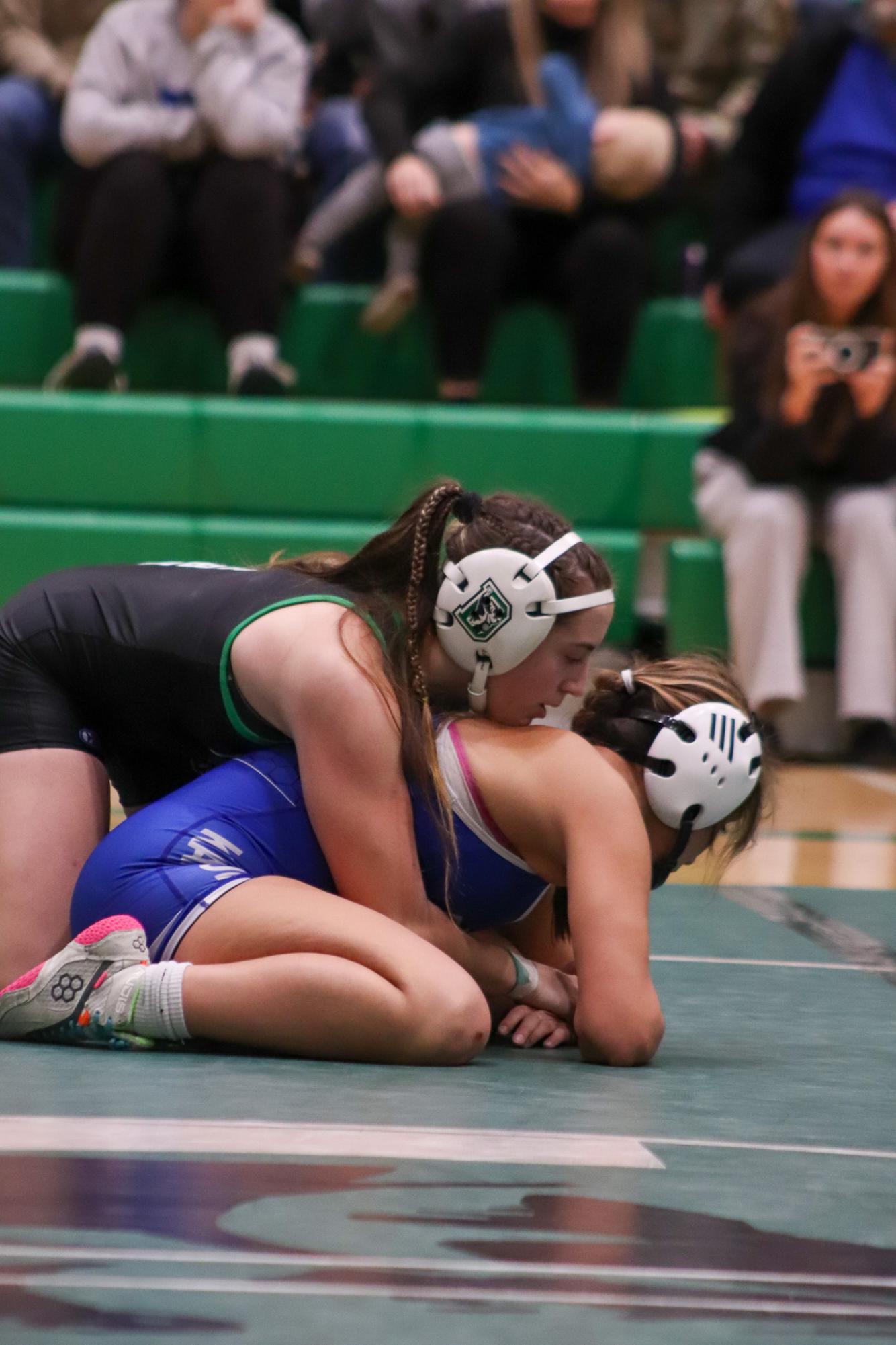 Girls and boys varsity wrestling vs. girls and boys Kapaun (Photos Delainey Stephenson)