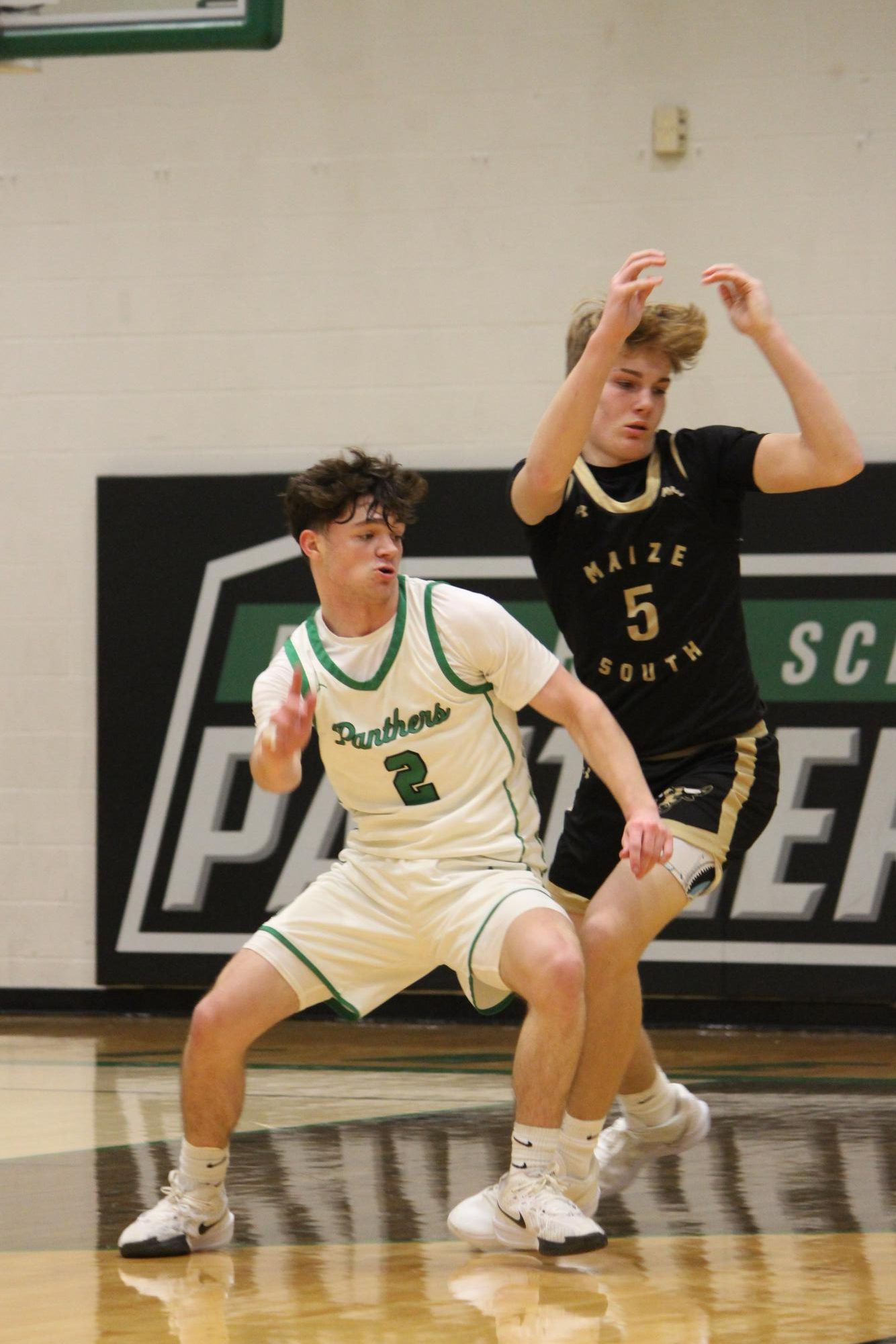 Boys varsity basketball vs. Maize south (Photos by Persephone Ivy)