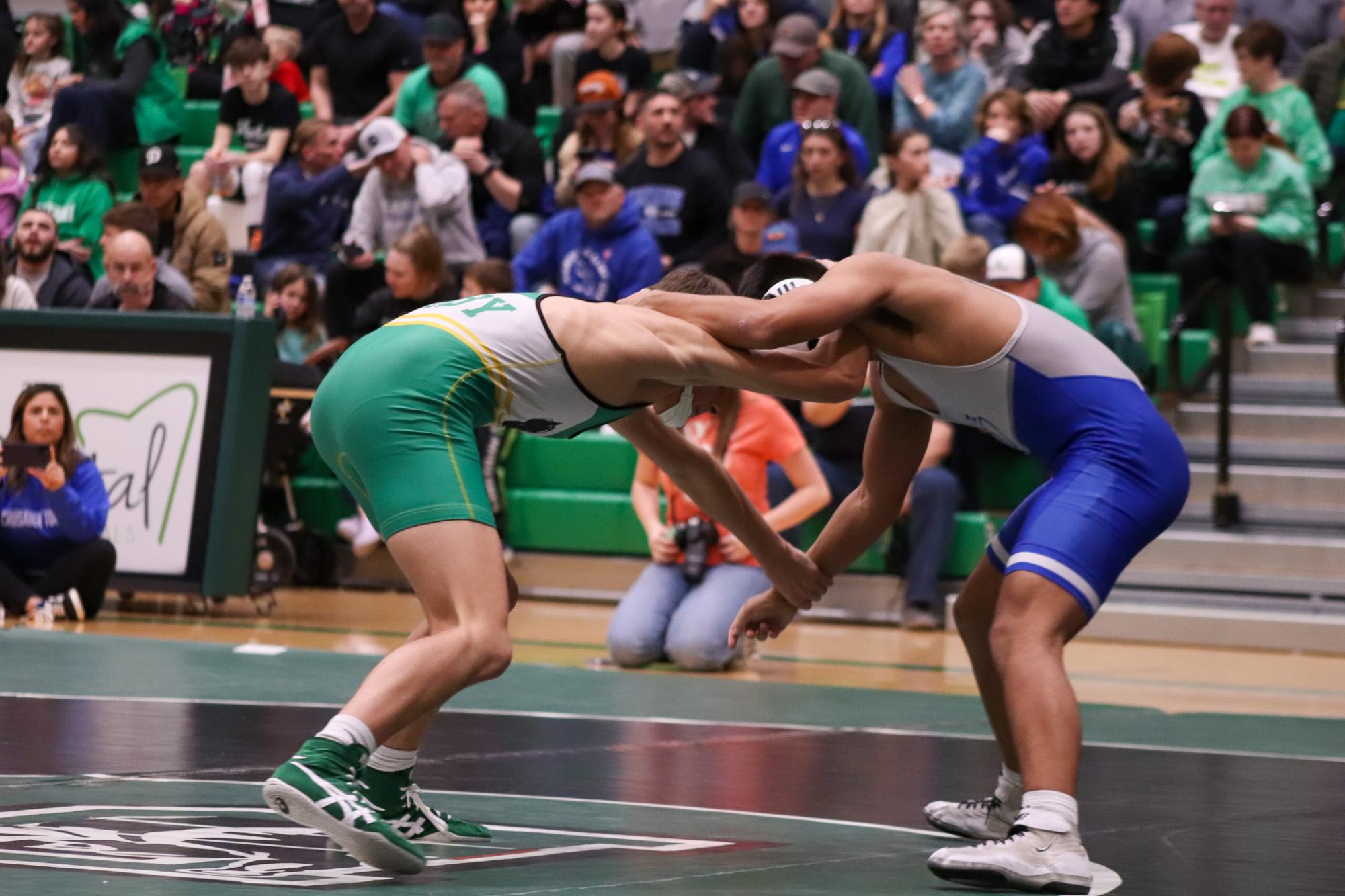 Girls and boys varsity wrestling vs. girls and boys Kapaun (Photos Delainey Stephenson)