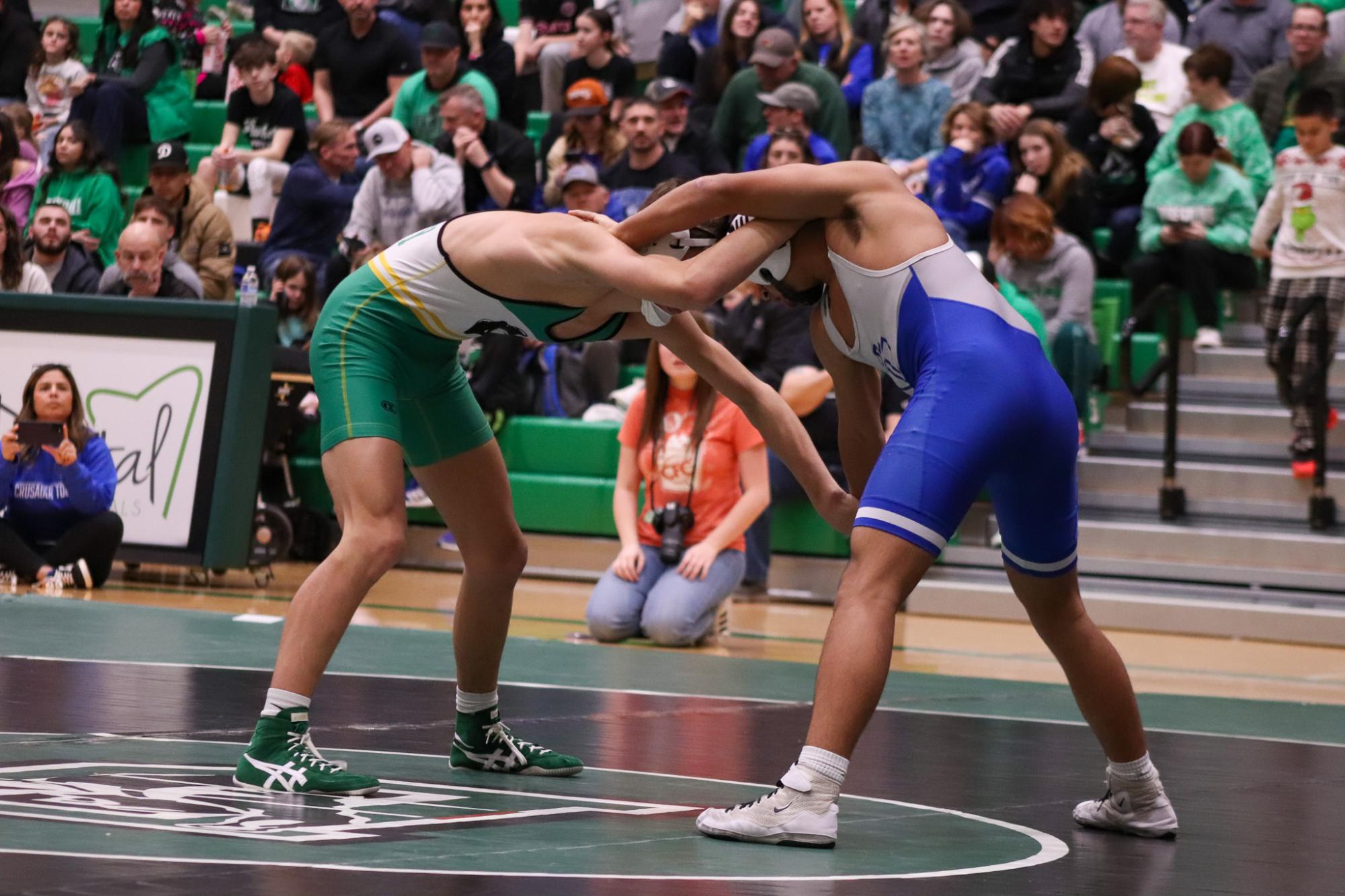 Girls and boys varsity wrestling vs. girls and boys Kapaun (Photos Delainey Stephenson)