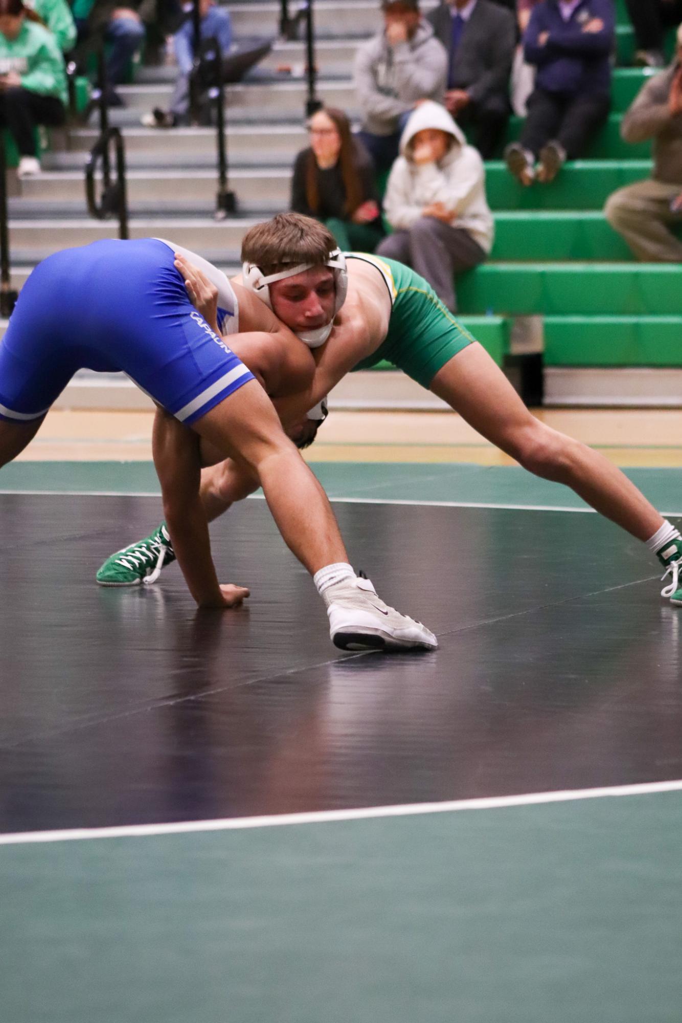 Girls and boys varsity wrestling vs. girls and boys Kapaun (Photos Delainey Stephenson)