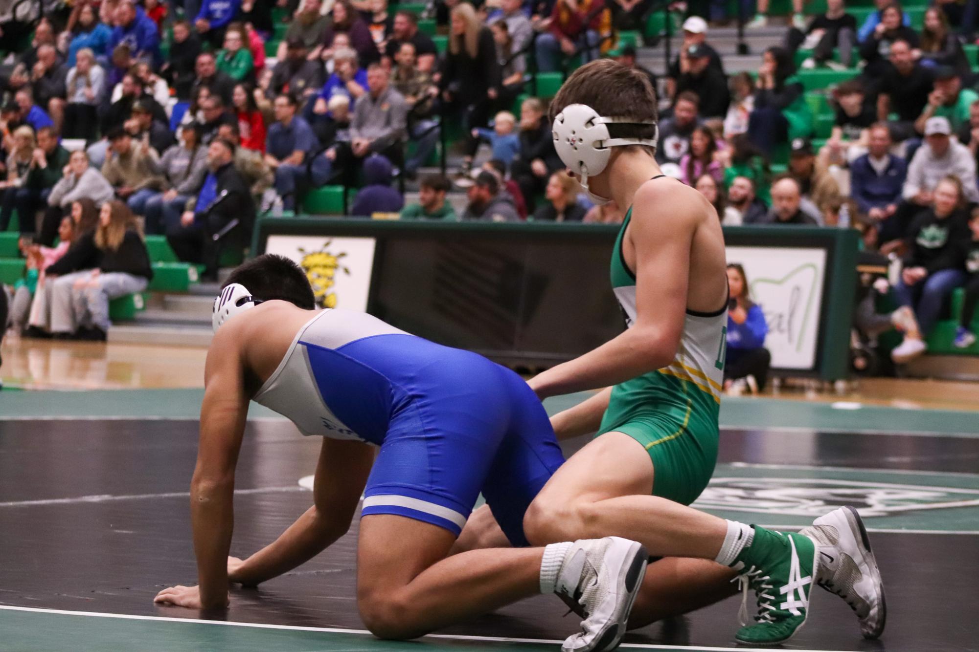 Girls and boys varsity wrestling vs. girls and boys Kapaun (Photos Delainey Stephenson)