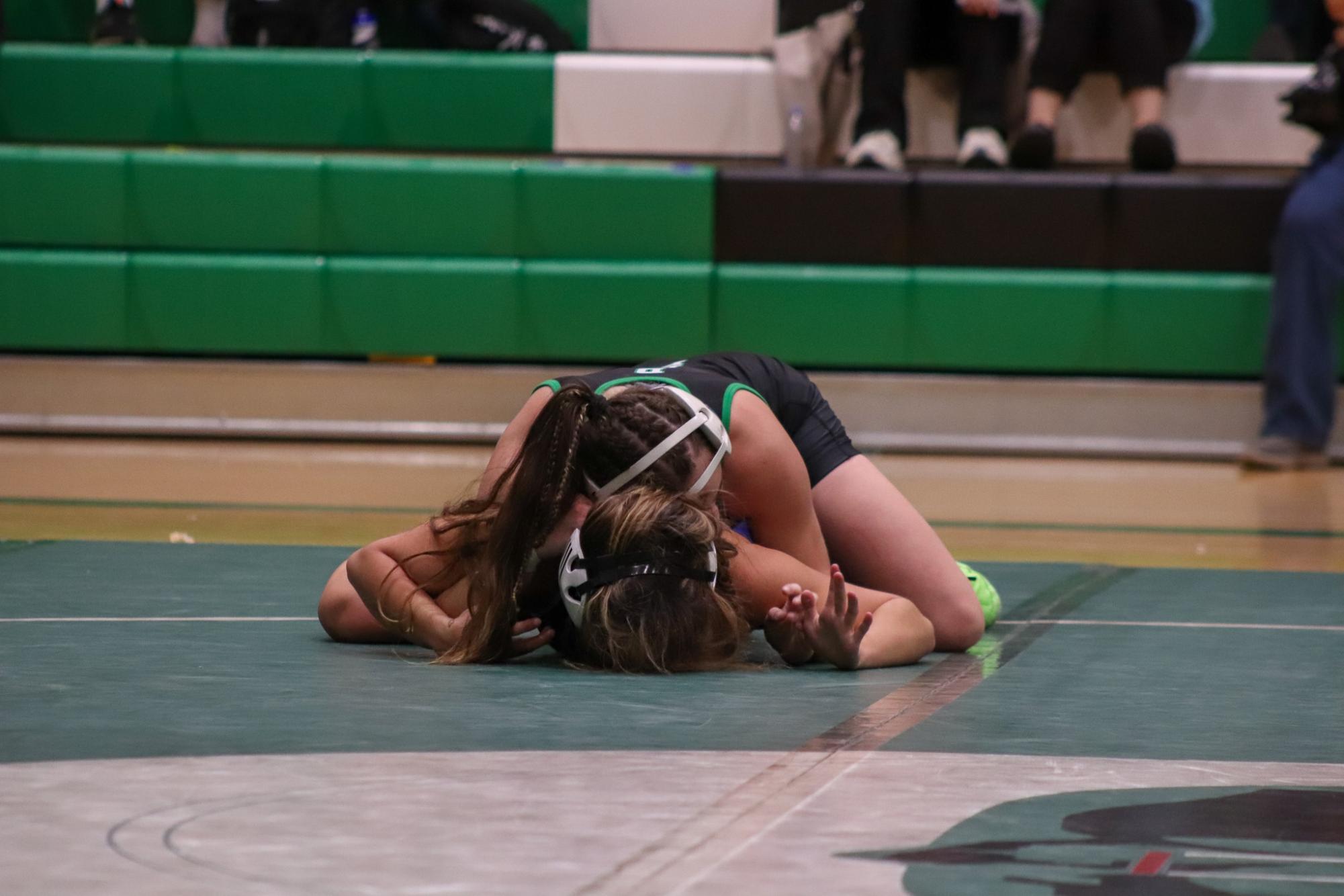 Girls and boys varsity wrestling vs. girls and boys Kapaun (Photos Delainey Stephenson)