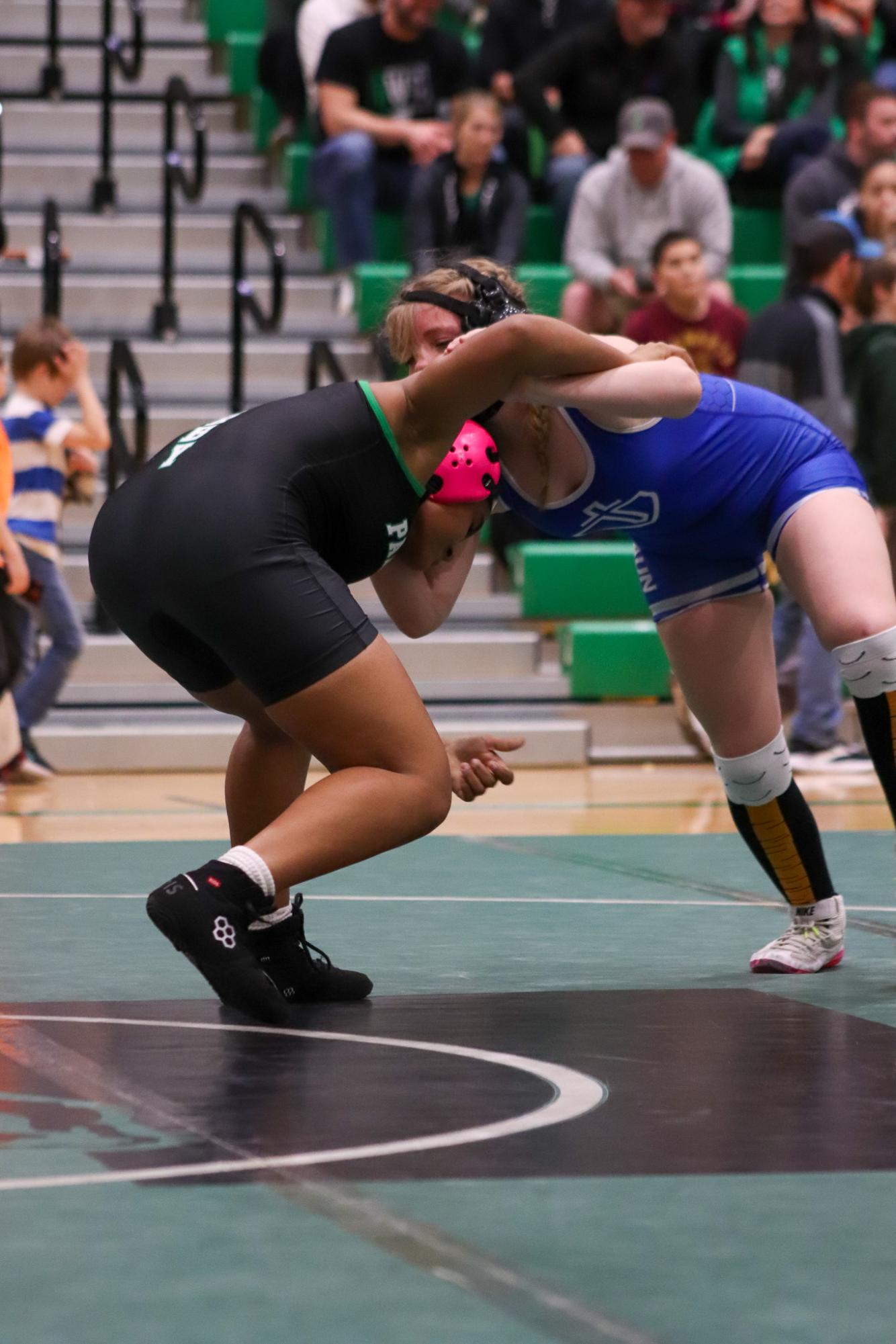 Girls and boys varsity wrestling vs. girls and boys Kapaun (Photos Delainey Stephenson)