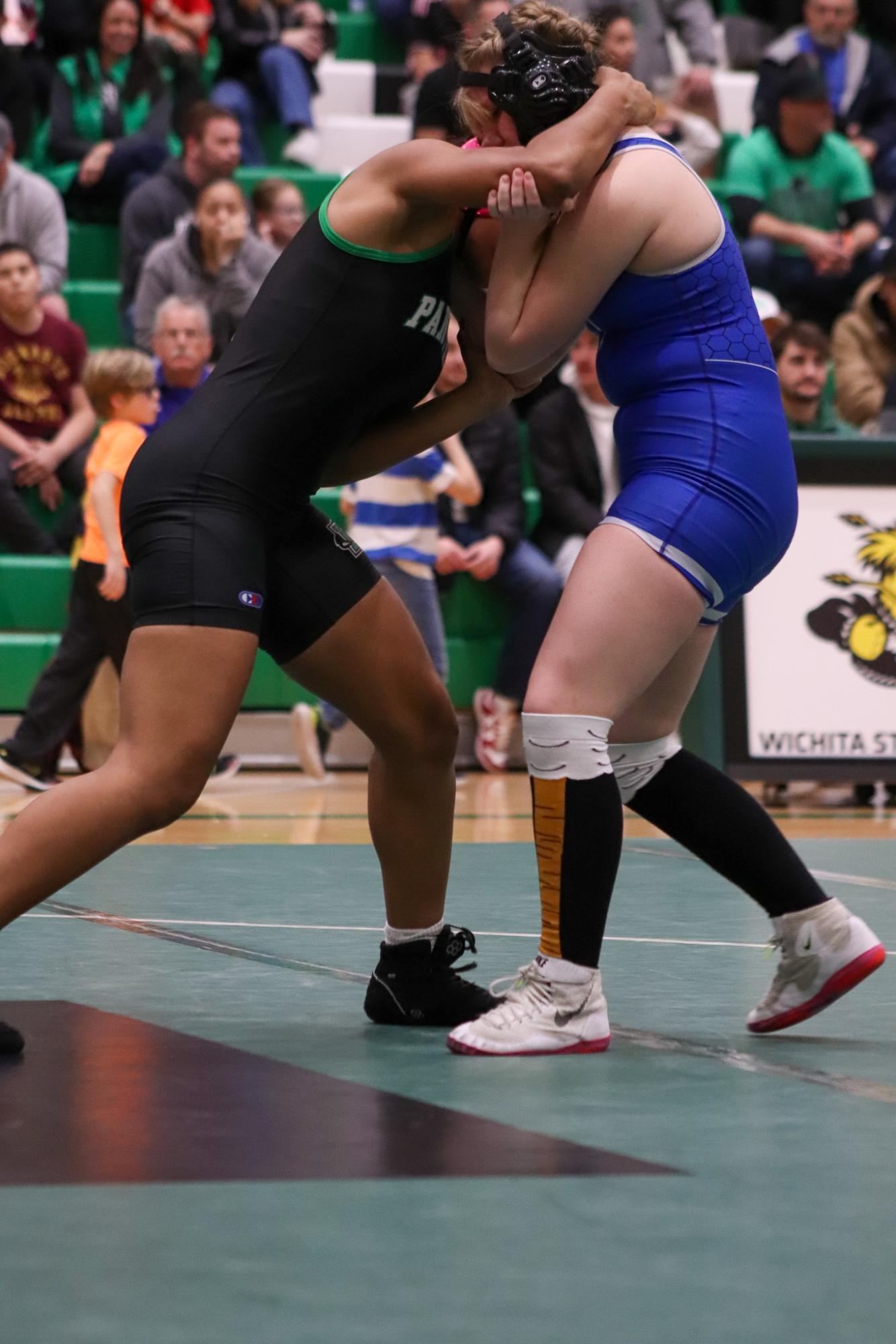 Girls and boys varsity wrestling vs. girls and boys Kapaun (Photos Delainey Stephenson)