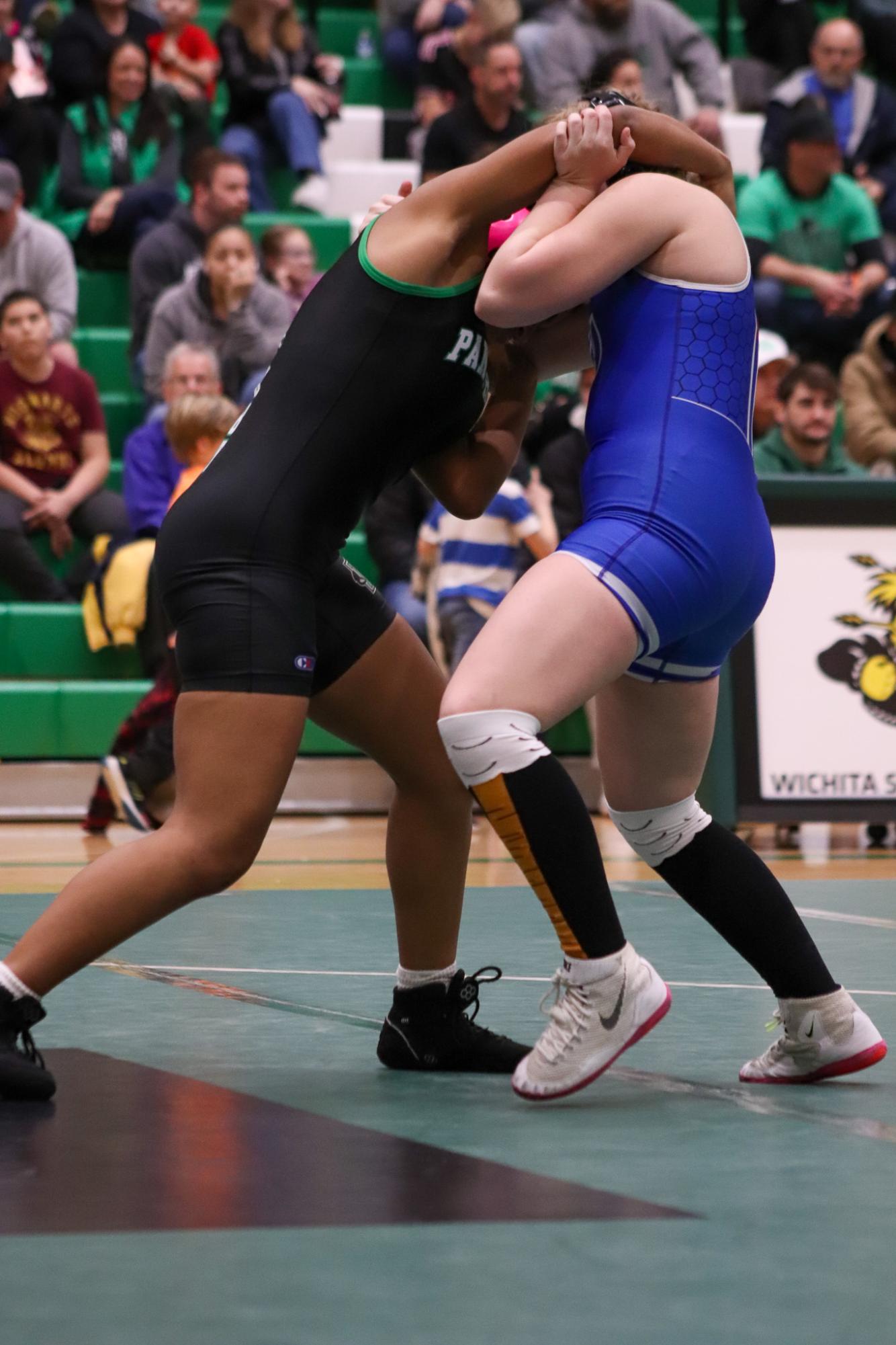 Girls and boys varsity wrestling vs. girls and boys Kapaun (Photos Delainey Stephenson)