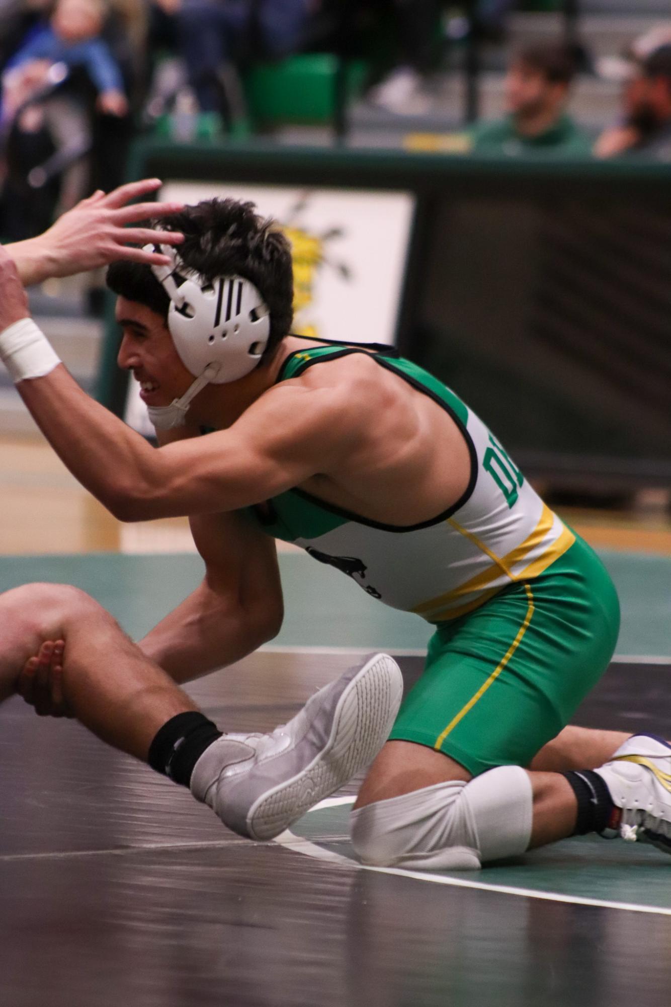 Girls and boys varsity wrestling vs. girls and boys Kapaun (Photos Delainey Stephenson)