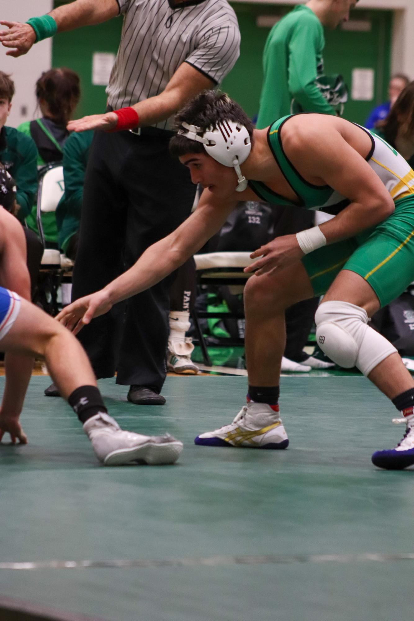 Girls and boys varsity wrestling vs. girls and boys Kapaun (Photos Delainey Stephenson)