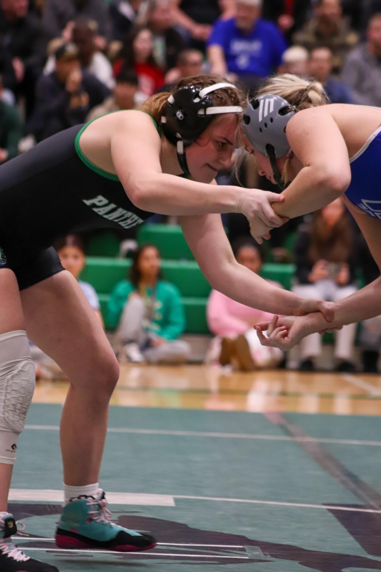 Girls and boys varsity wrestling vs. girls and boys Kapaun (Photos Delainey Stephenson)