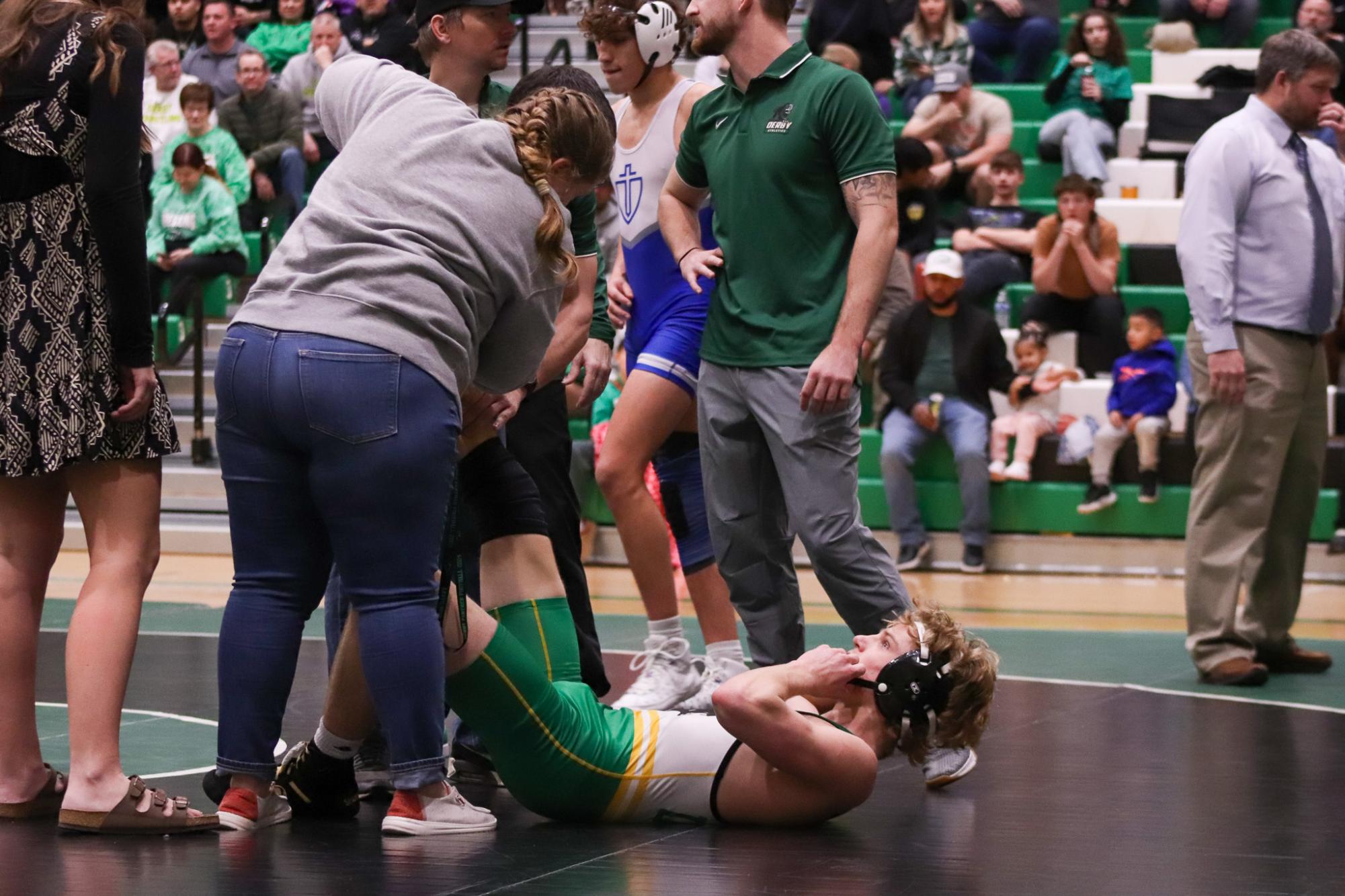 Girls and boys varsity wrestling vs. girls and boys Kapaun (Photos Delainey Stephenson)