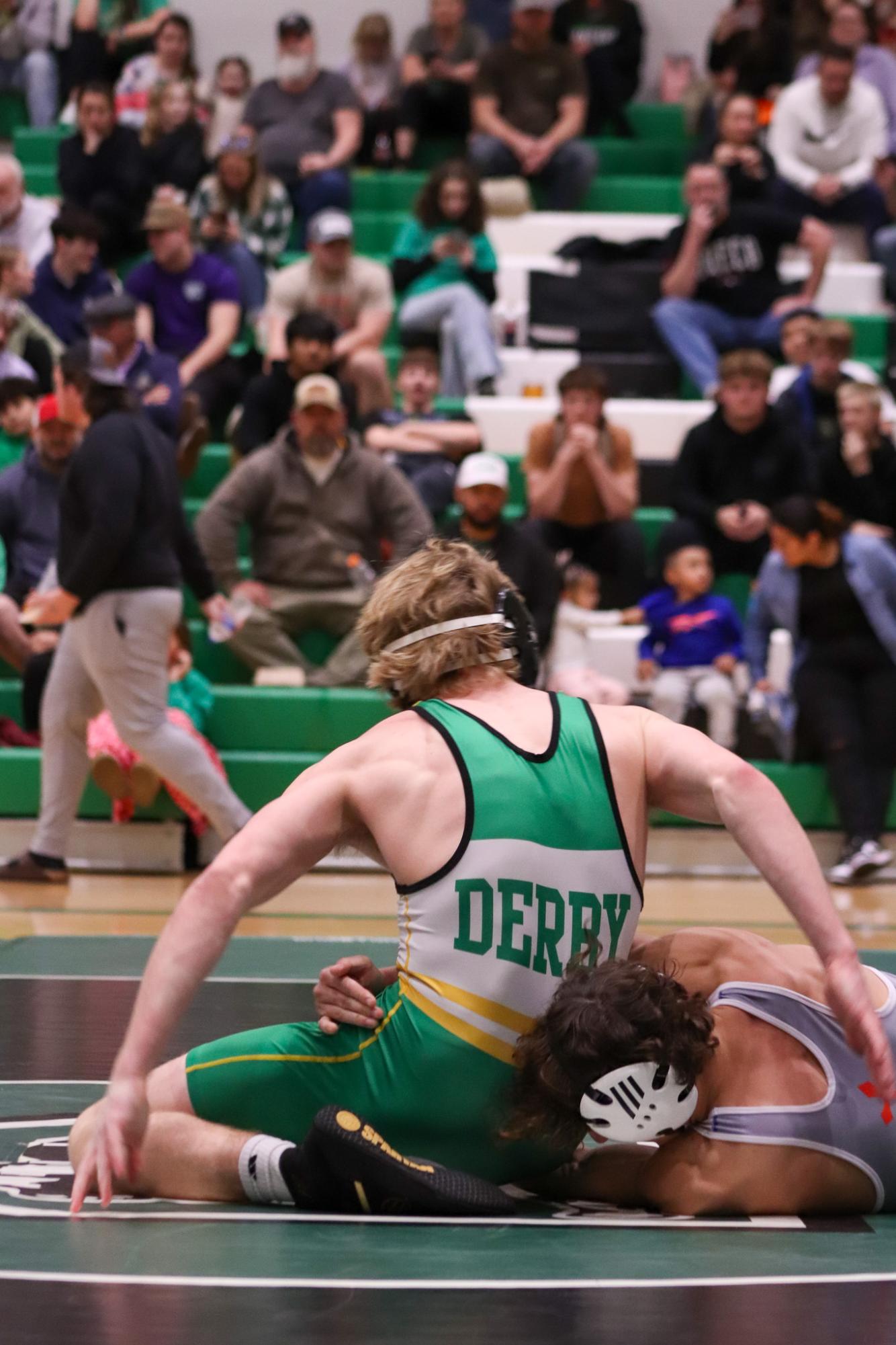 Girls and boys varsity wrestling vs. girls and boys Kapaun (Photos Delainey Stephenson)