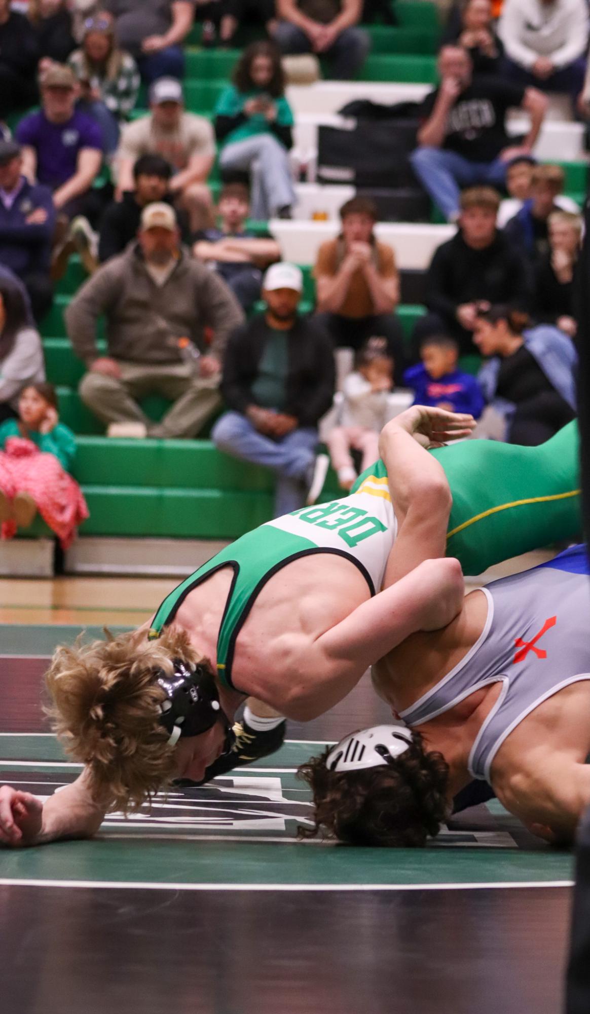 Girls and boys varsity wrestling vs. girls and boys Kapaun (Photos Delainey Stephenson)