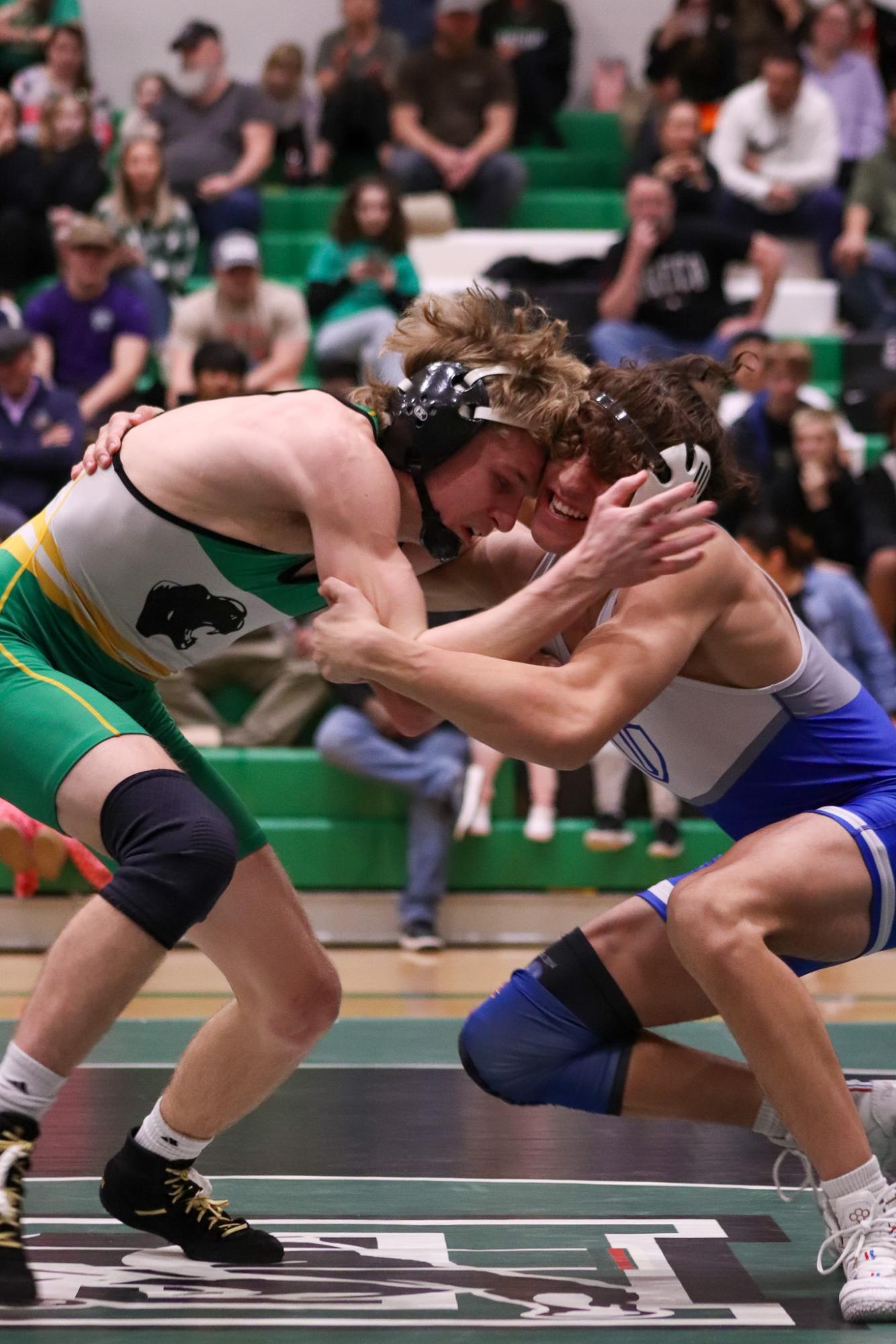 Wrestling vs. Kapaun, Dec. 19, at 6 pm with girls winning 44-30 and boy winning as well with 50-25.  