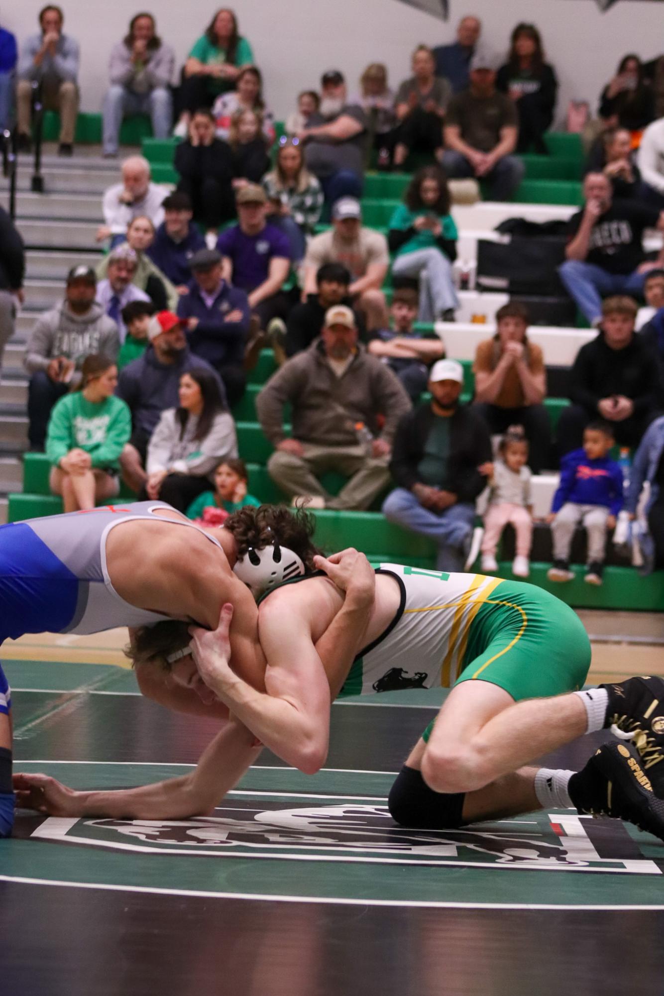 Girls and boys varsity wrestling vs. girls and boys Kapaun (Photos Delainey Stephenson)