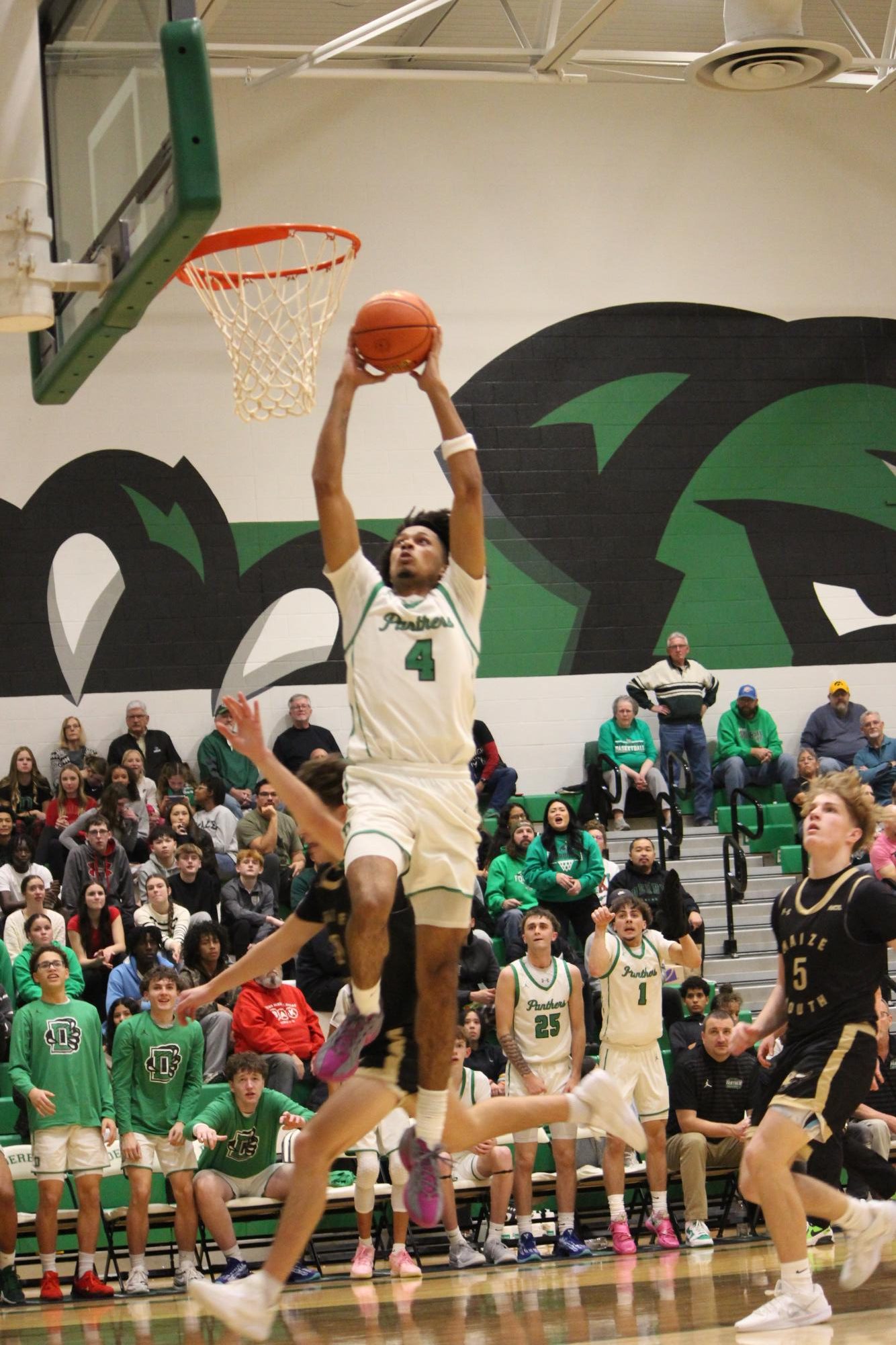 Boys varsity basketball vs. Maize south (Photos by Persephone Ivy)