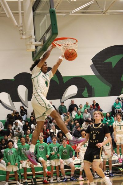 Navigation to Story: Boys varsity basketball vs. Maize south (Photos by Persephone Ivy)