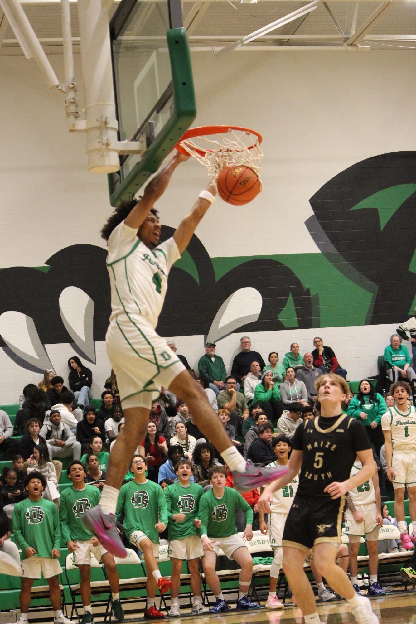 Boys varsity basketball vs. Maize south (Photos by Persephone Ivy)