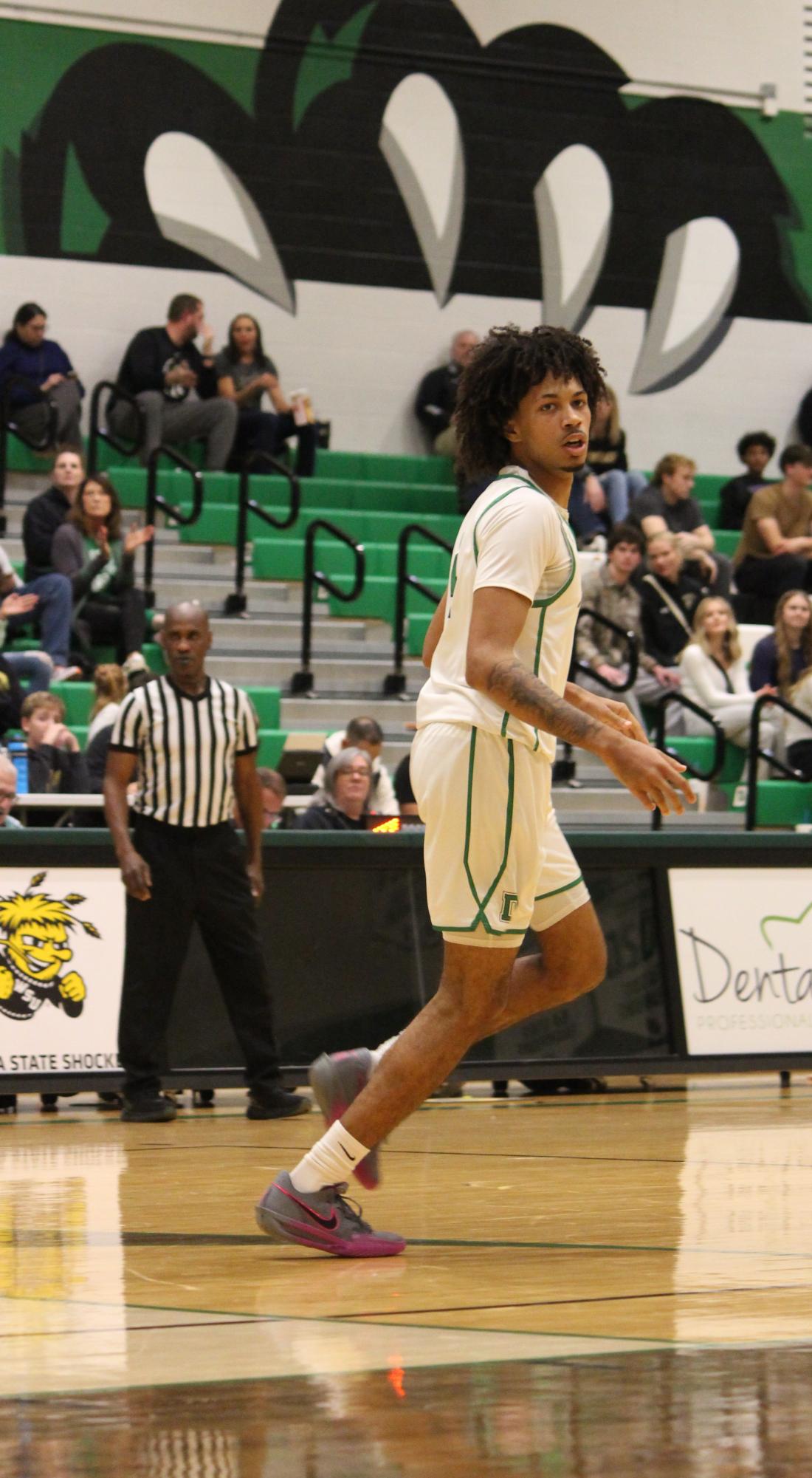 Boys varsity basketball vs. Maize south (Photos by Persephone Ivy)