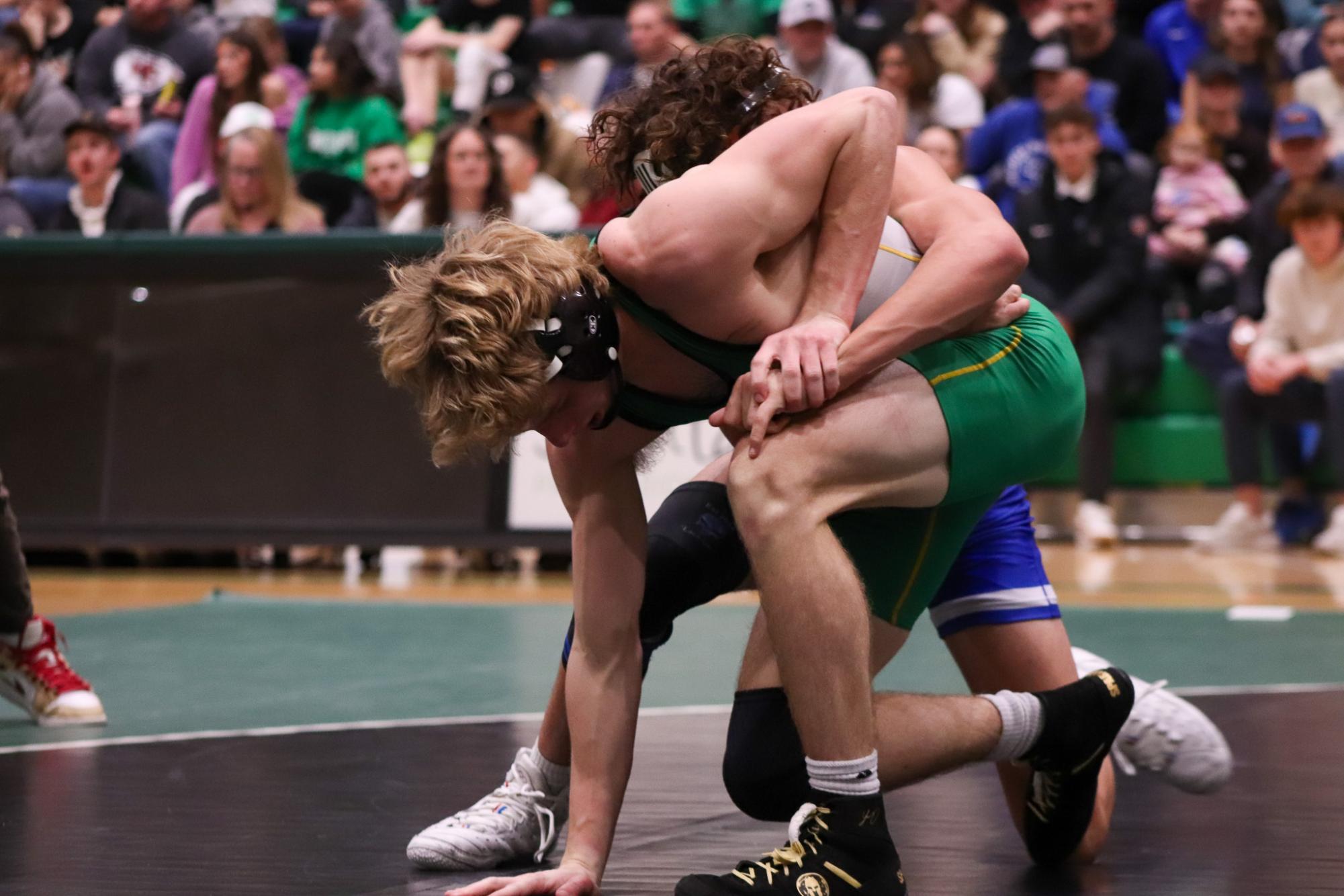 Girls and boys varsity wrestling vs. girls and boys Kapaun (Photos Delainey Stephenson)