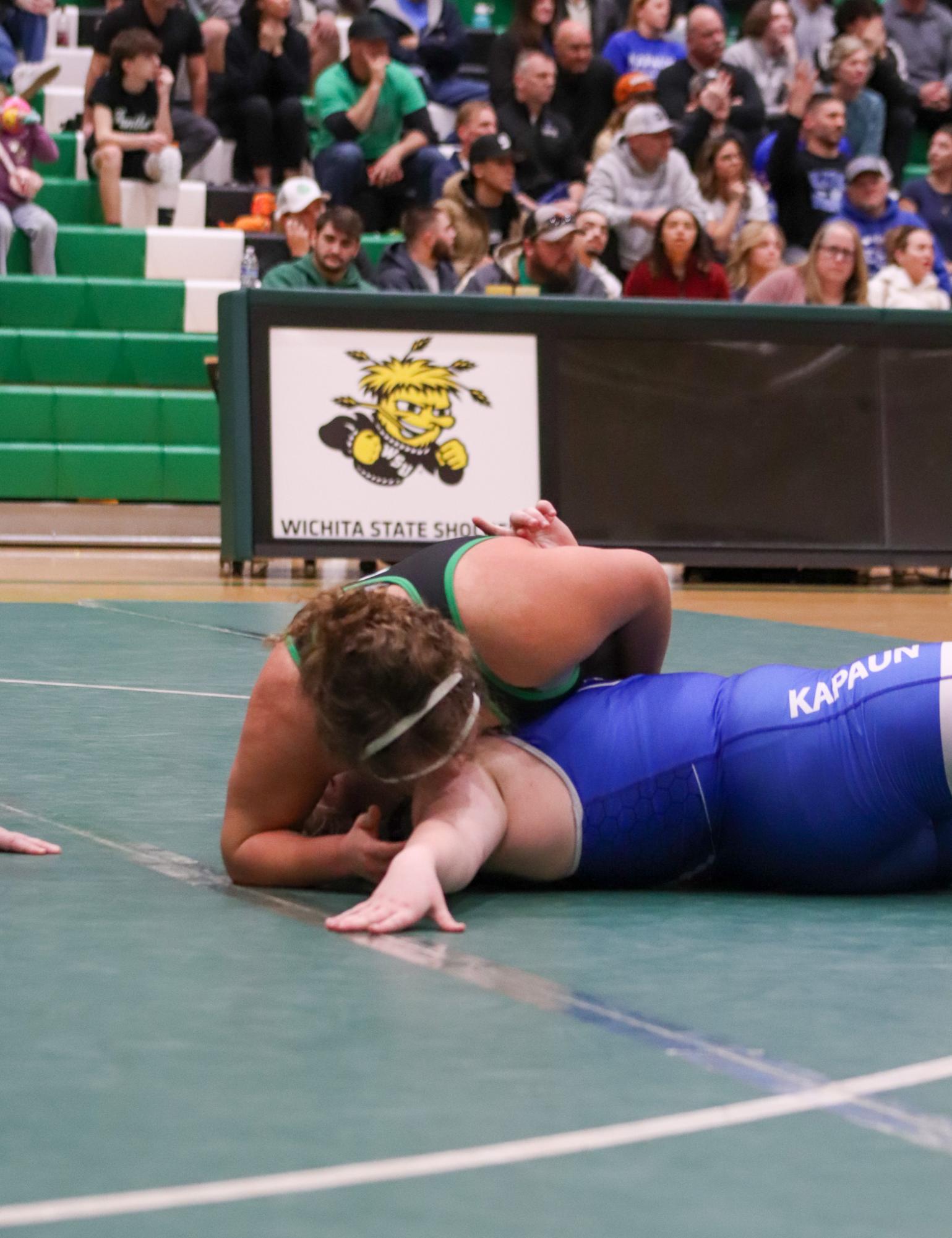 Girls and boys varsity wrestling vs. girls and boys Kapaun (Photos Delainey Stephenson)