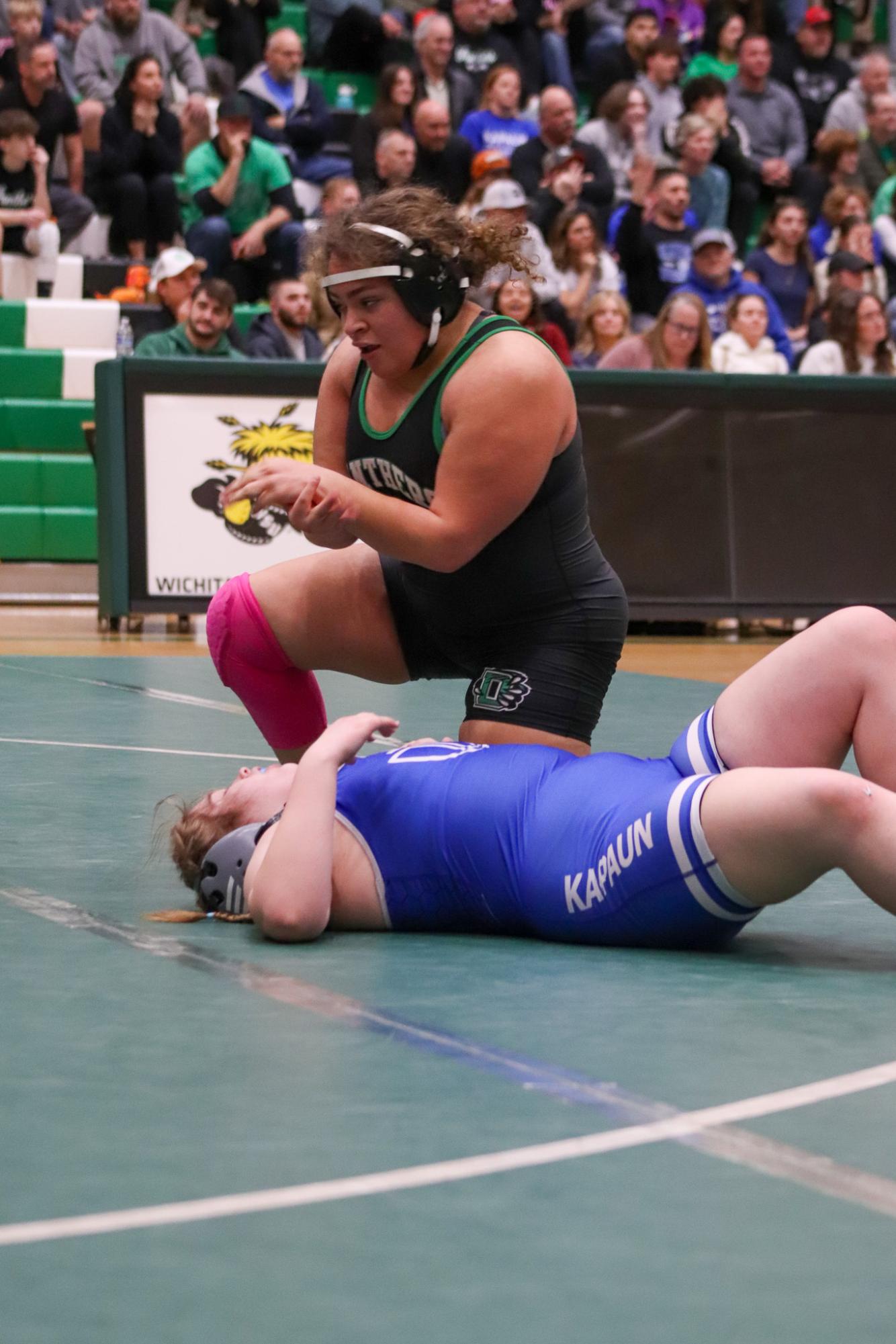 Girls and boys varsity wrestling vs. girls and boys Kapaun (Photos Delainey Stephenson)