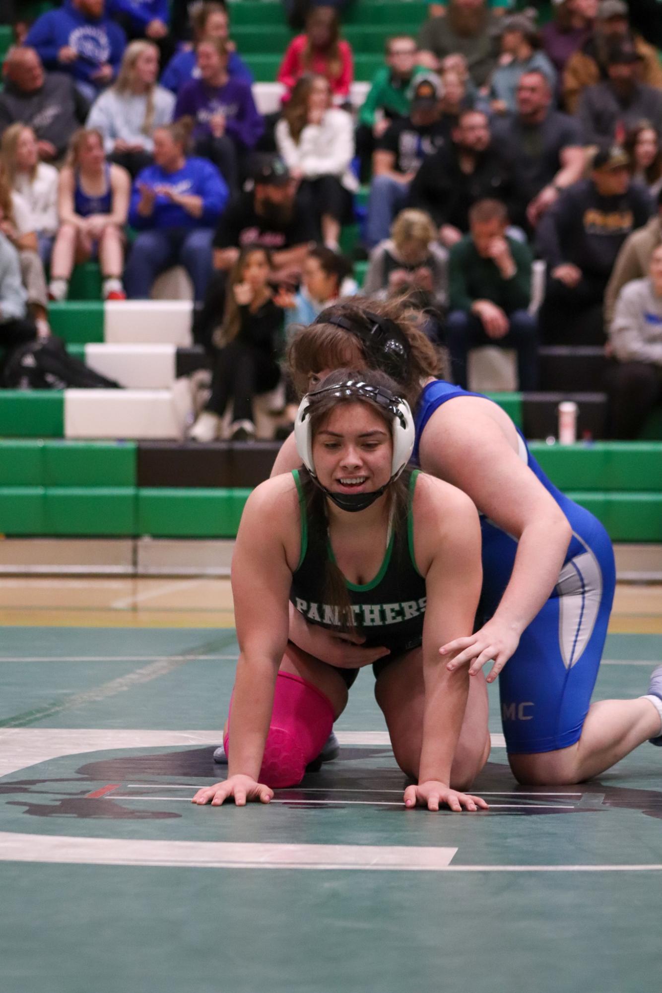 Girls and boys varsity wrestling vs. girls and boys Kapaun (Photos Delainey Stephenson)