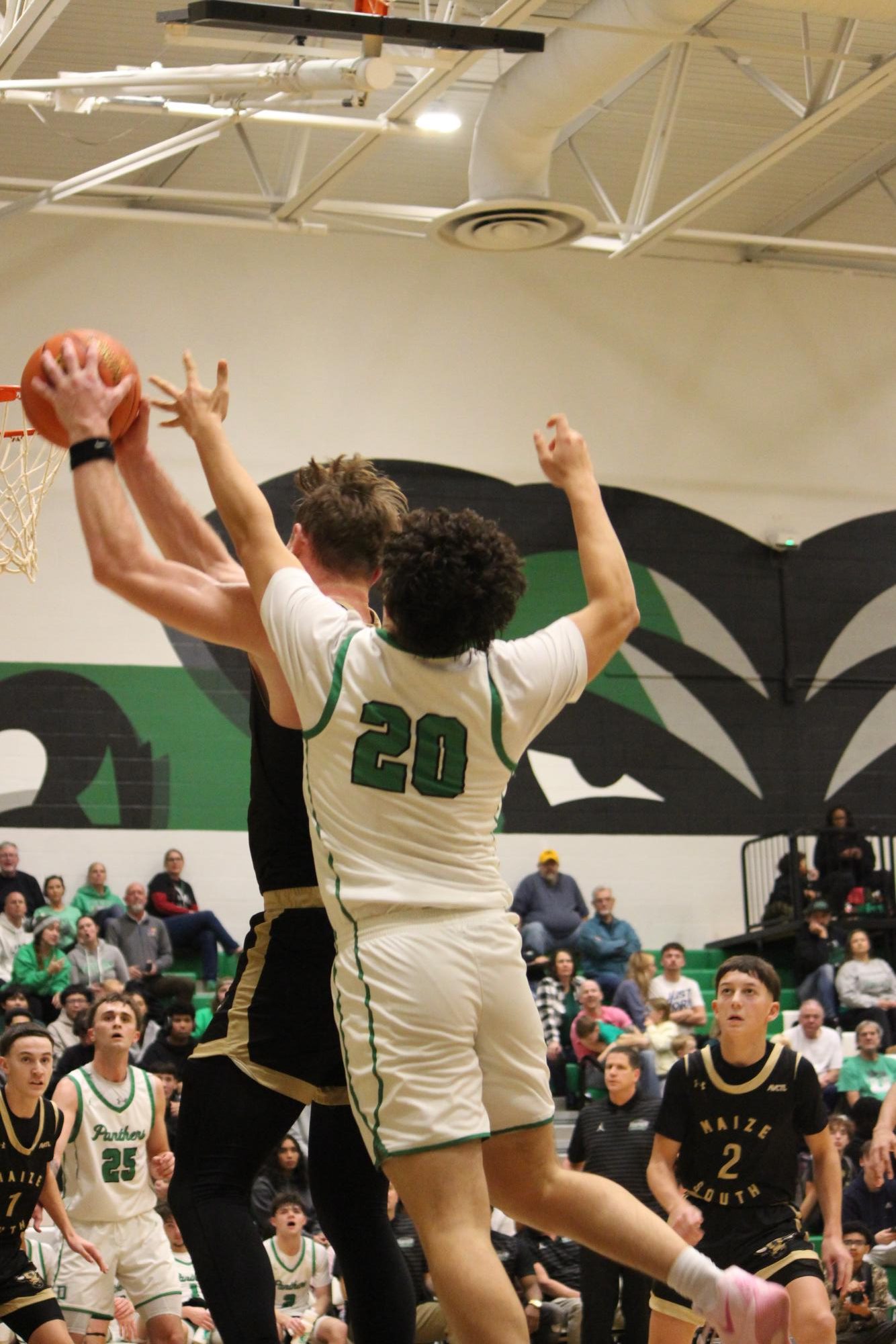 Boys varsity basketball vs. Maize south (Photos by Persephone Ivy)