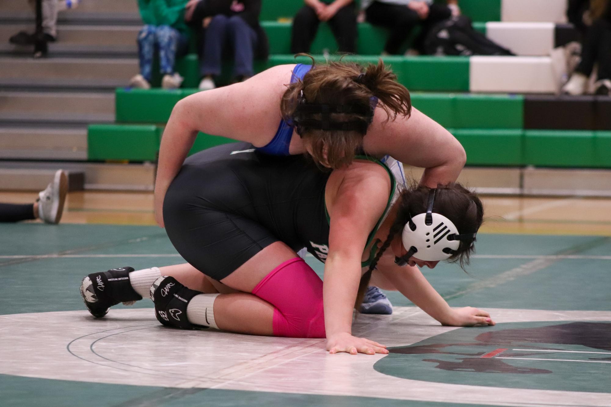 Girls and boys varsity wrestling vs. girls and boys Kapaun (Photos Delainey Stephenson)