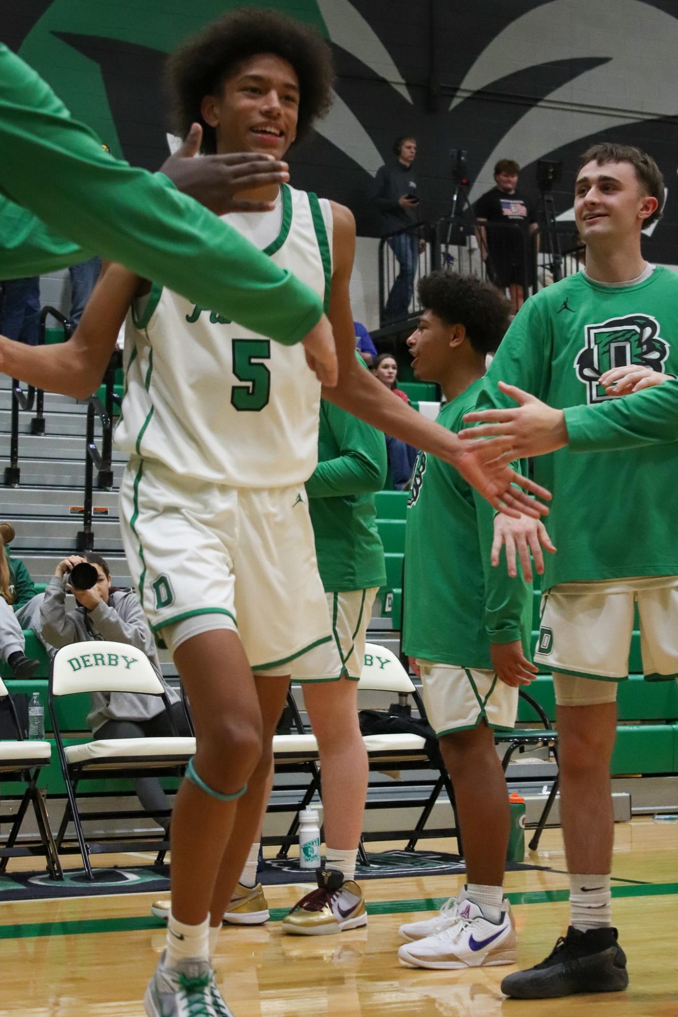 Varsity Boys basketball vs. McPherson  (Photos by Delainey Stephenson)