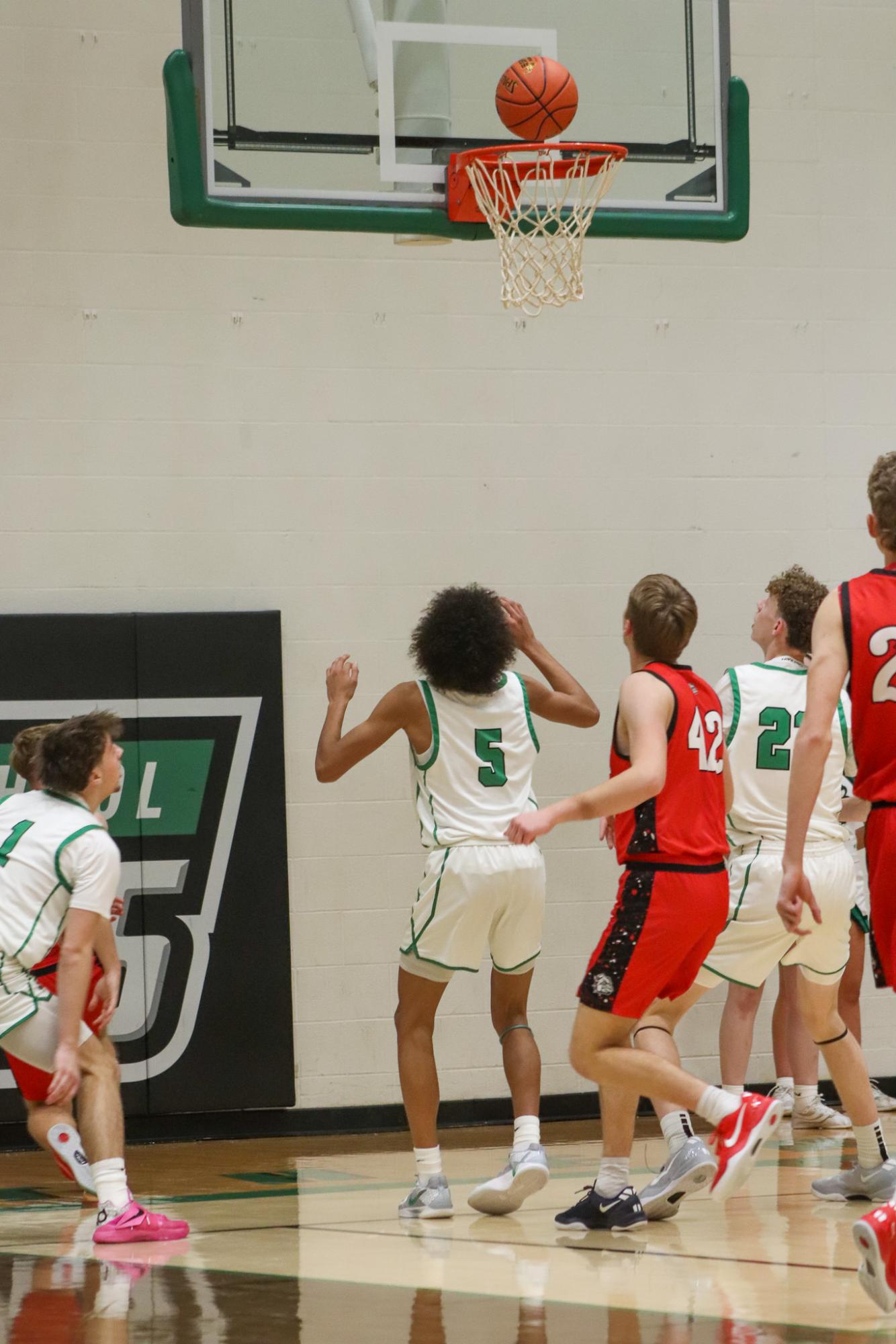 Varsity Boys basketball vs. McPherson  (Photos by Delainey Stephenson)