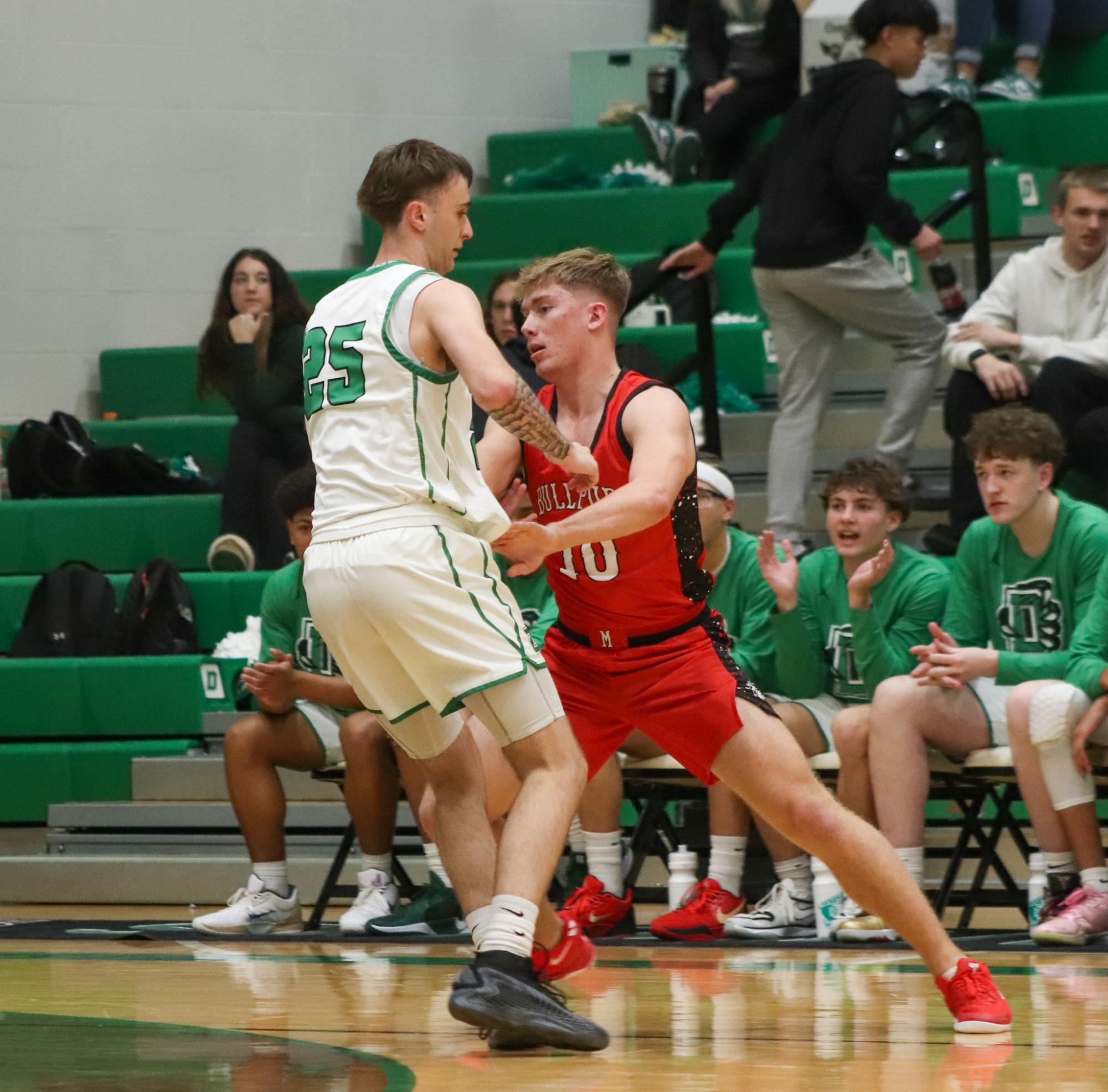 Varsity Boys basketball vs. McPherson  (Photos by Delainey Stephenson)