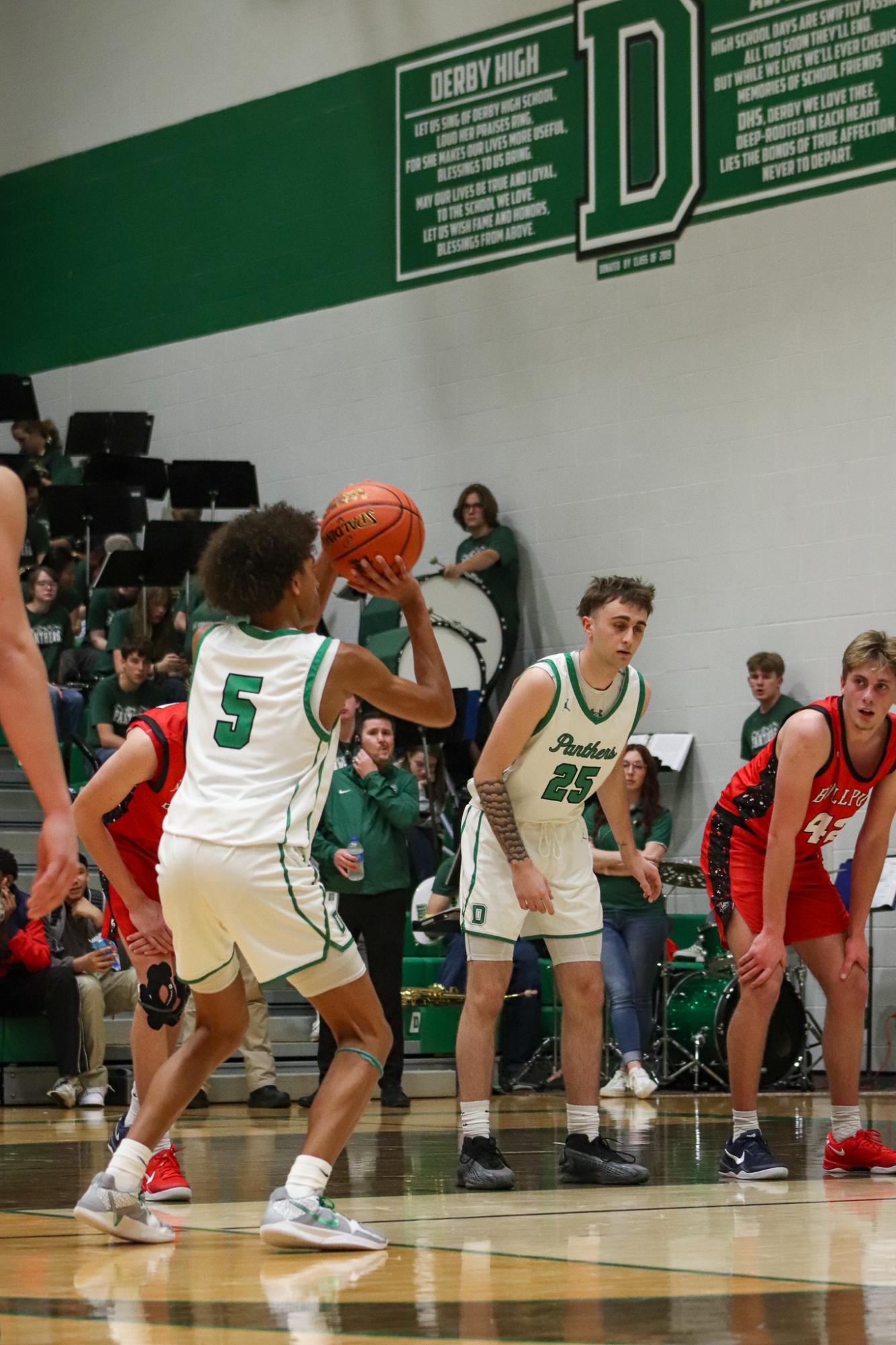 Varsity Boys basketball vs. McPherson  (Photos by Delainey Stephenson)