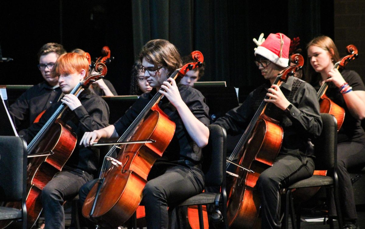 Cellos play together.