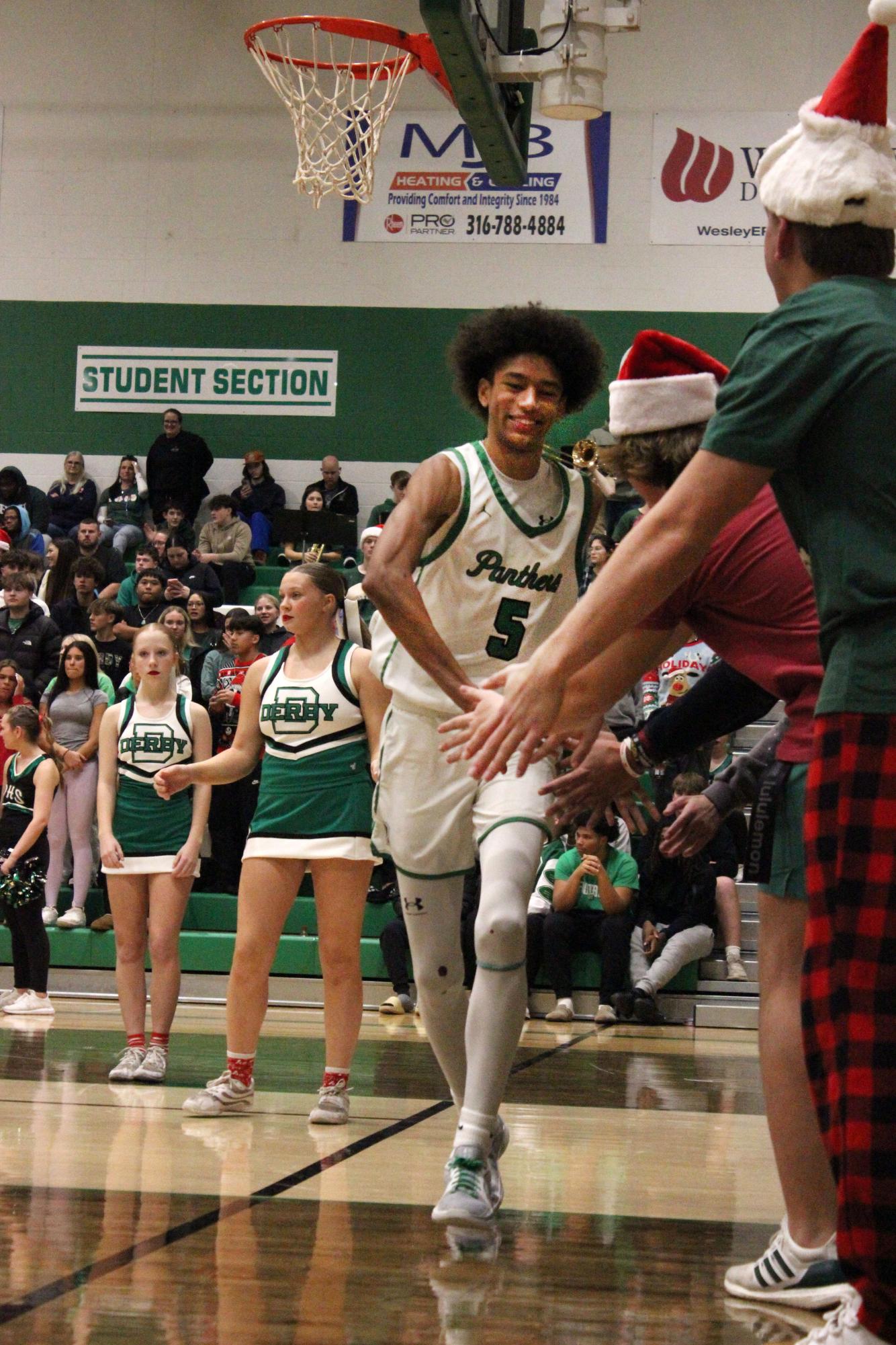 Boys varsity basketball vs. Maize South (Photos by Bree Stuhlsatz)