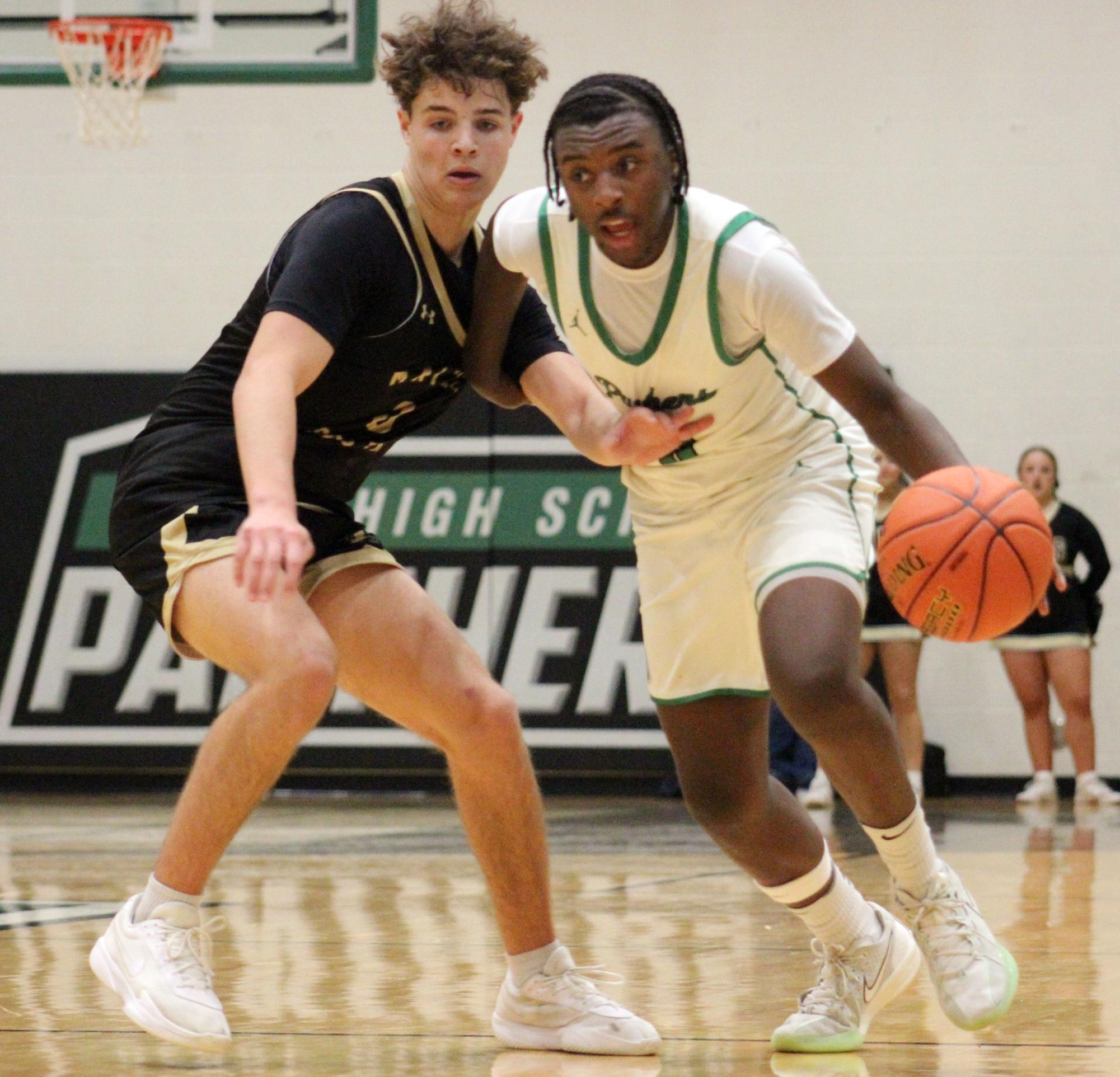 Boys varsity basketball vs. Maize South (Photos by Bree Stuhlsatz)