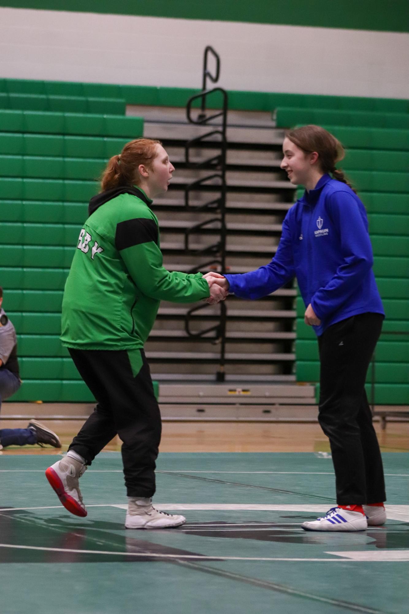 Girls and boys varsity wrestling vs. girls and boys Kapaun (Photos Delainey Stephenson)