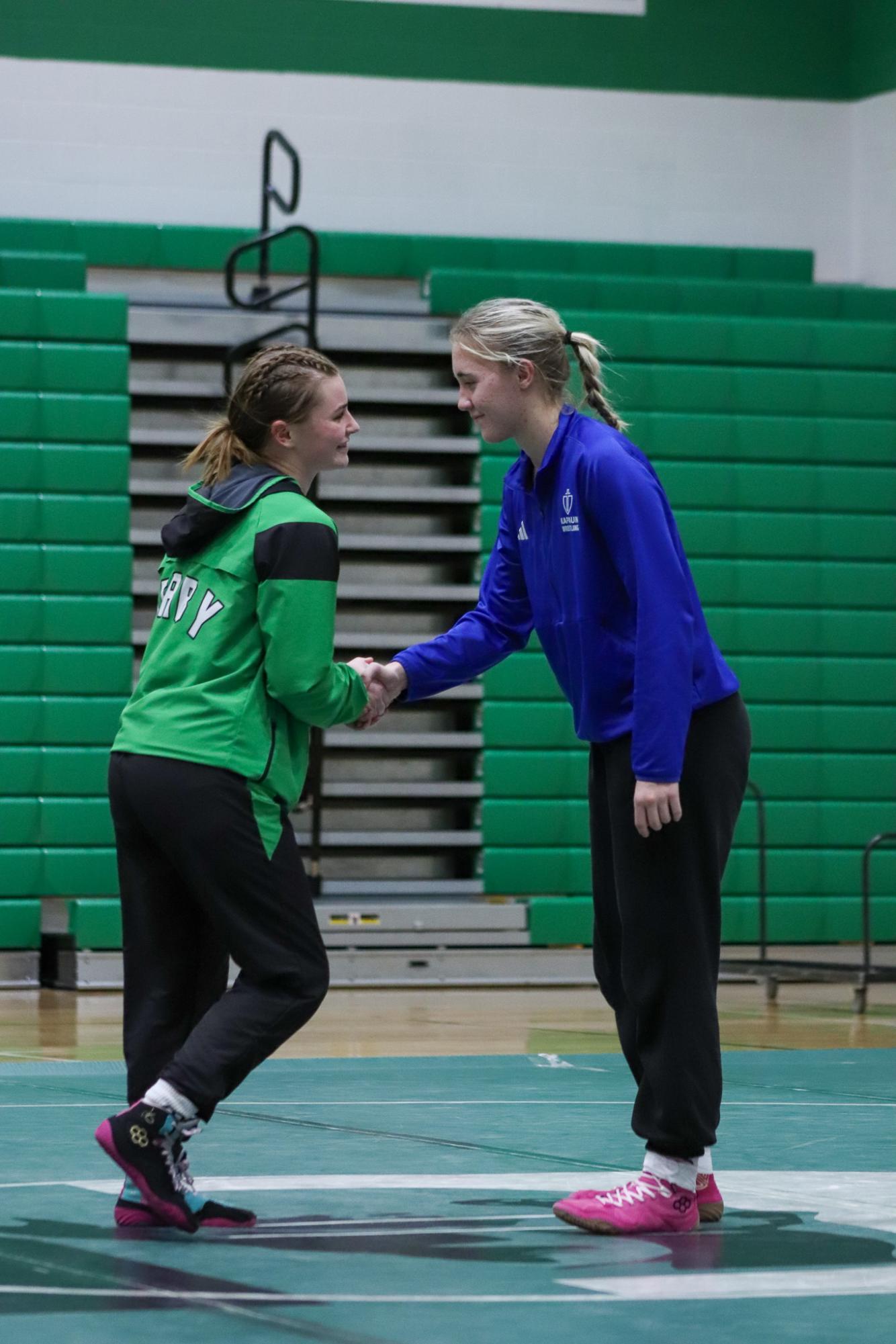 Girls and boys varsity wrestling vs. girls and boys Kapaun (Photos Delainey Stephenson)