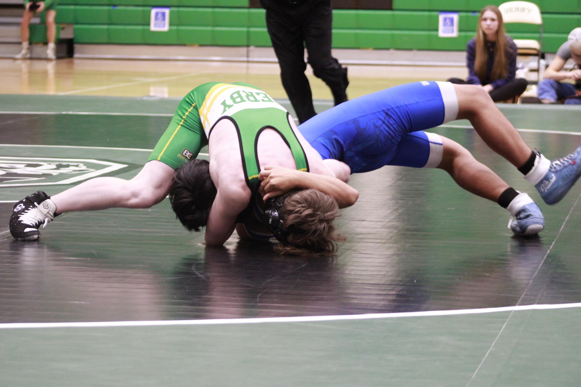 Boys Wrestling vs. Kapaun (Photos by Ella Davidson)