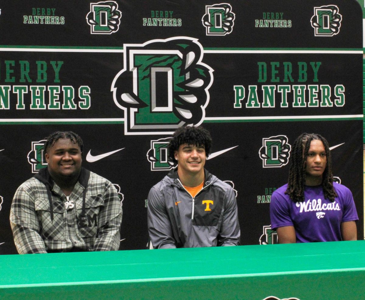 Senior's Milan Colvin, Da'Saahn Brame, and Martel Jackson pose for a picture after signing.